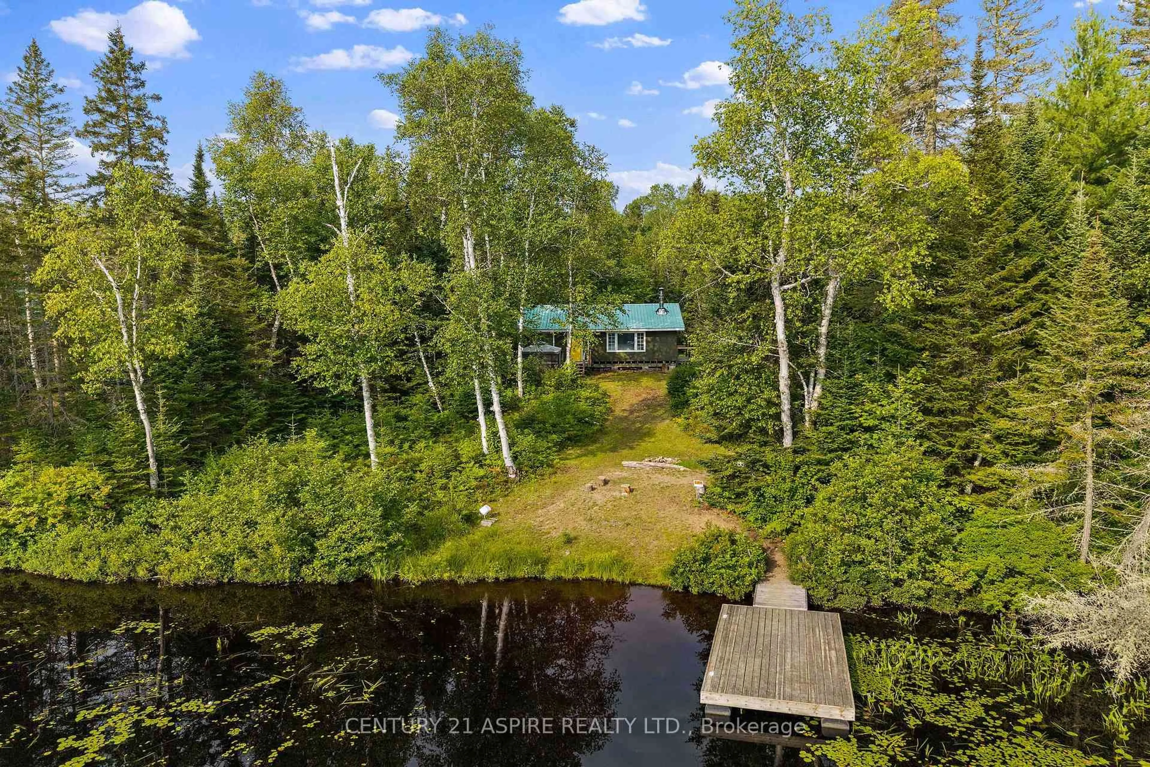 A pic from outside/outdoor area/front of a property/back of a property/a pic from drone, water/lake/river/ocean view for 1953 Little Papineau Lake Rd, Maple Leaf Ontario K0L 2R0