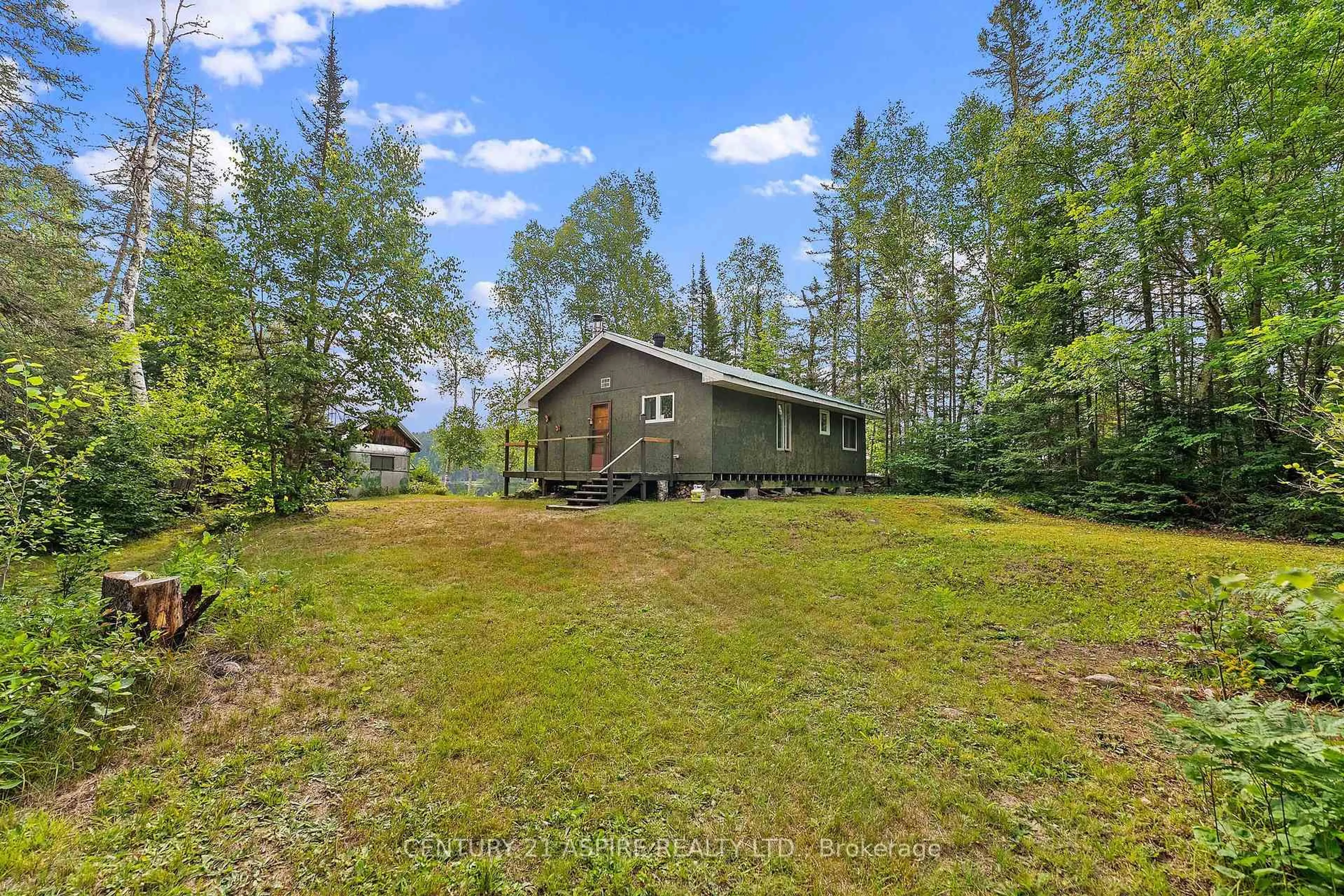 A pic from outside/outdoor area/front of a property/back of a property/a pic from drone, water/lake/river/ocean view for 1953 Little Papineau Lake Rd, Maple Leaf Ontario K0L 2R0