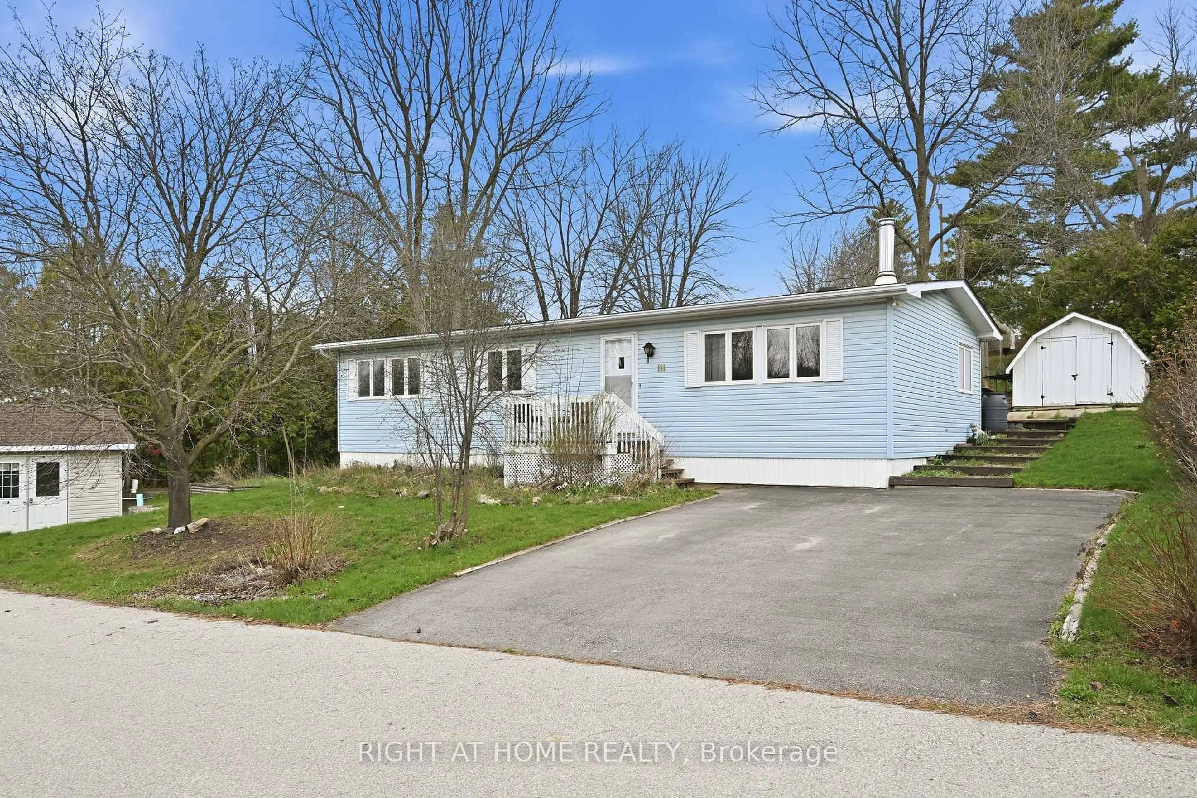 A pic from outside/outdoor area/front of a property/back of a property/a pic from drone, street for 1294 8th Concession Rd #131, Hamilton Ontario N0B 2J0