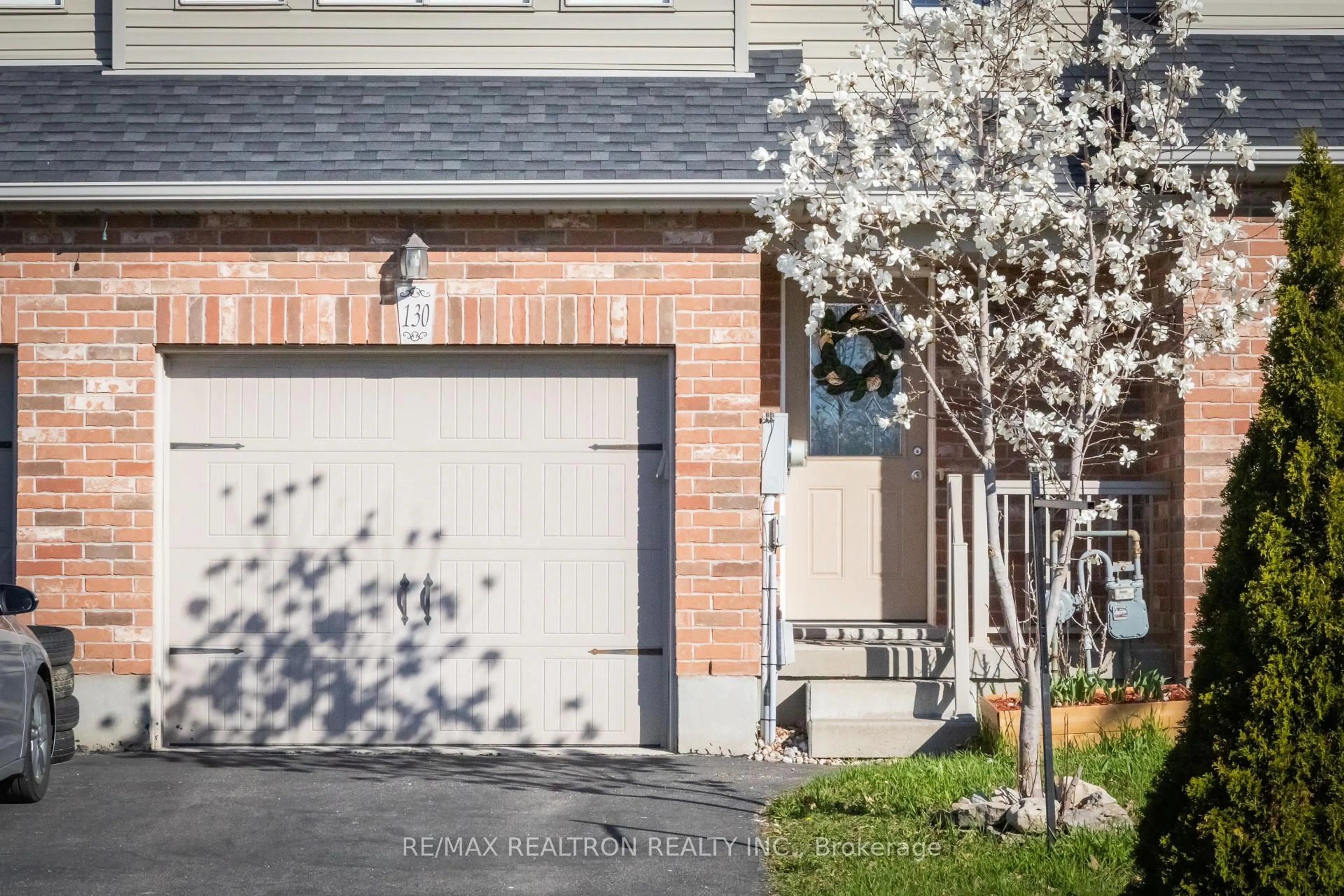 Home with brick exterior material, street for 130 Simmonds Dr, Guelph Ontario L7A 0P3