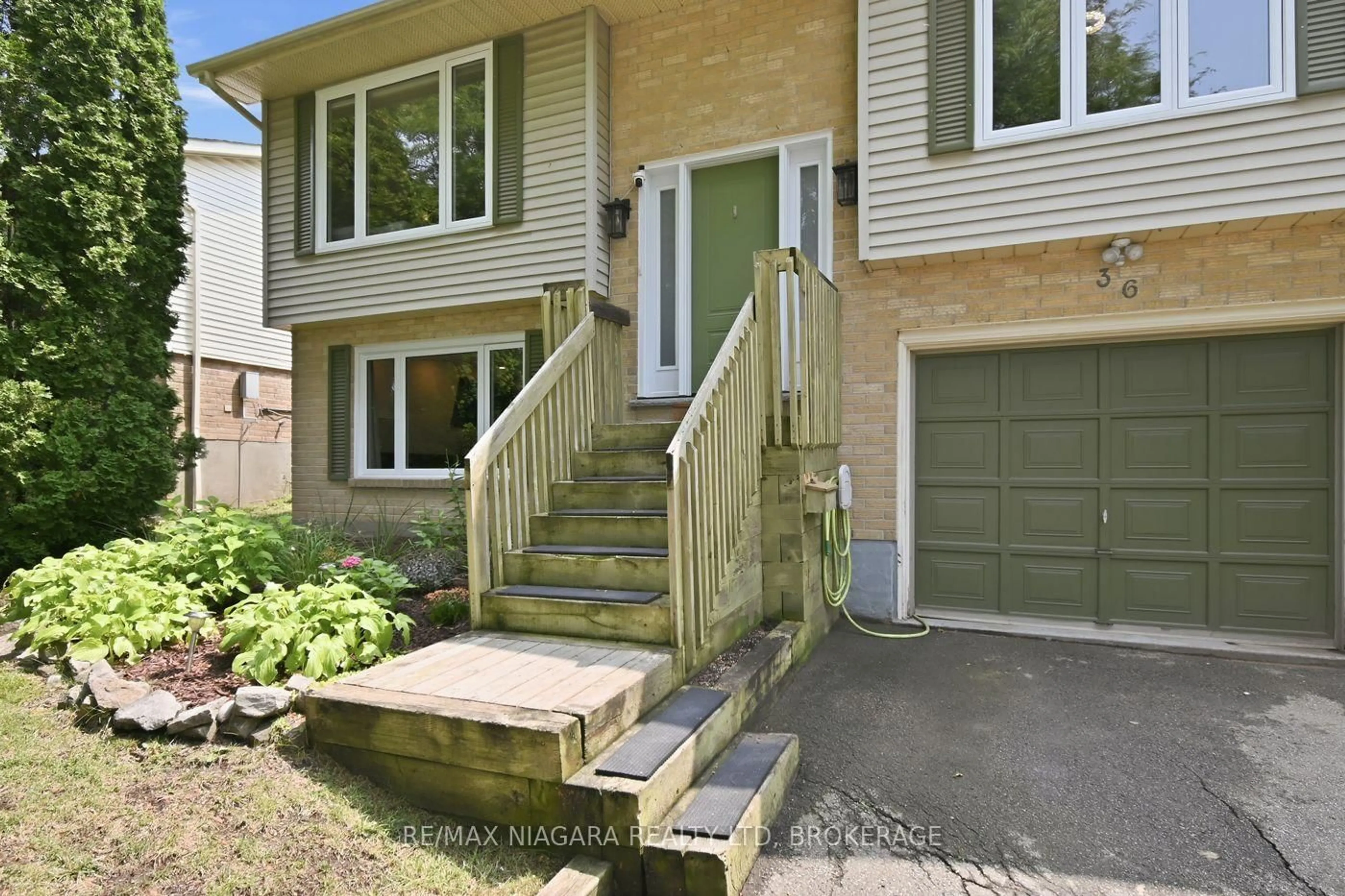 Home with vinyl exterior material, street for 36 Hemlock St, St. Catharines Ontario L2T 4B7
