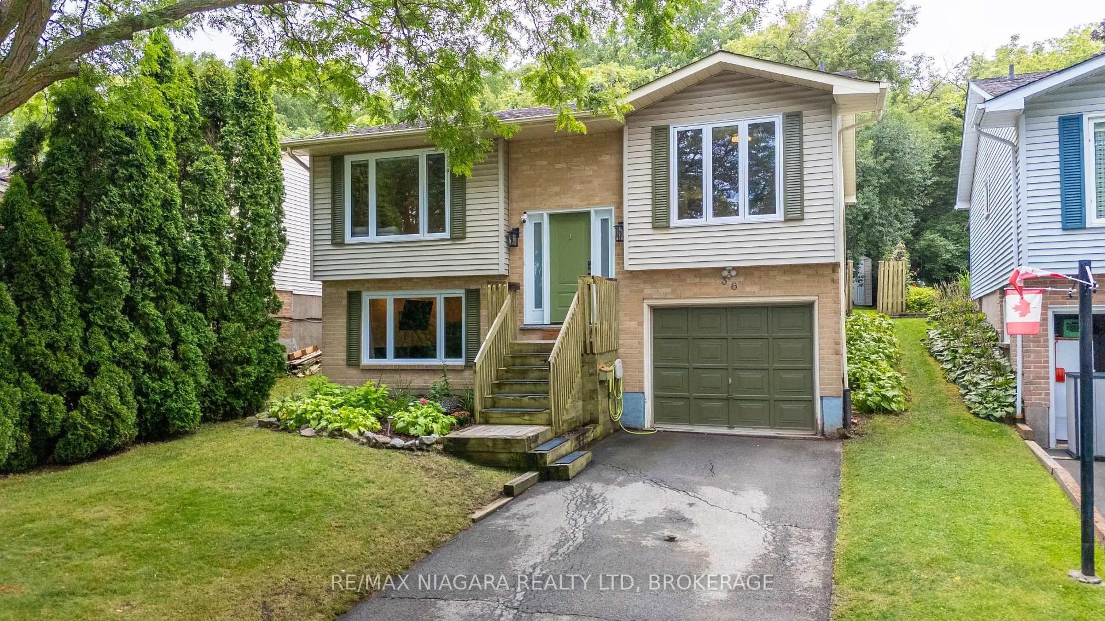 Home with vinyl exterior material, street for 36 Hemlock St, St. Catharines Ontario L2T 4B7