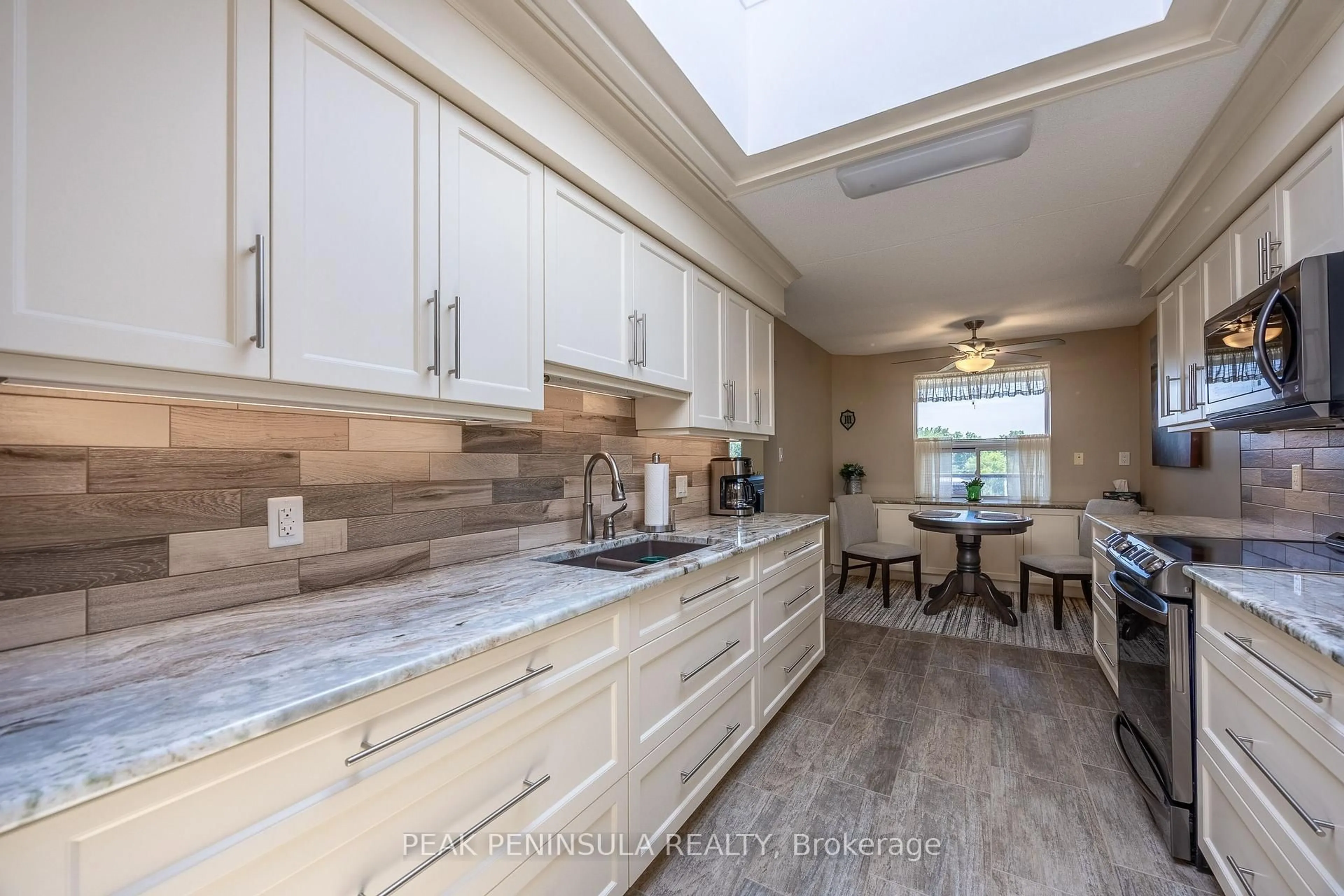 Open concept kitchen, ceramic/tile floor for 17 Mill Pond Crt #601, Norfolk Ontario N3Y 5H9