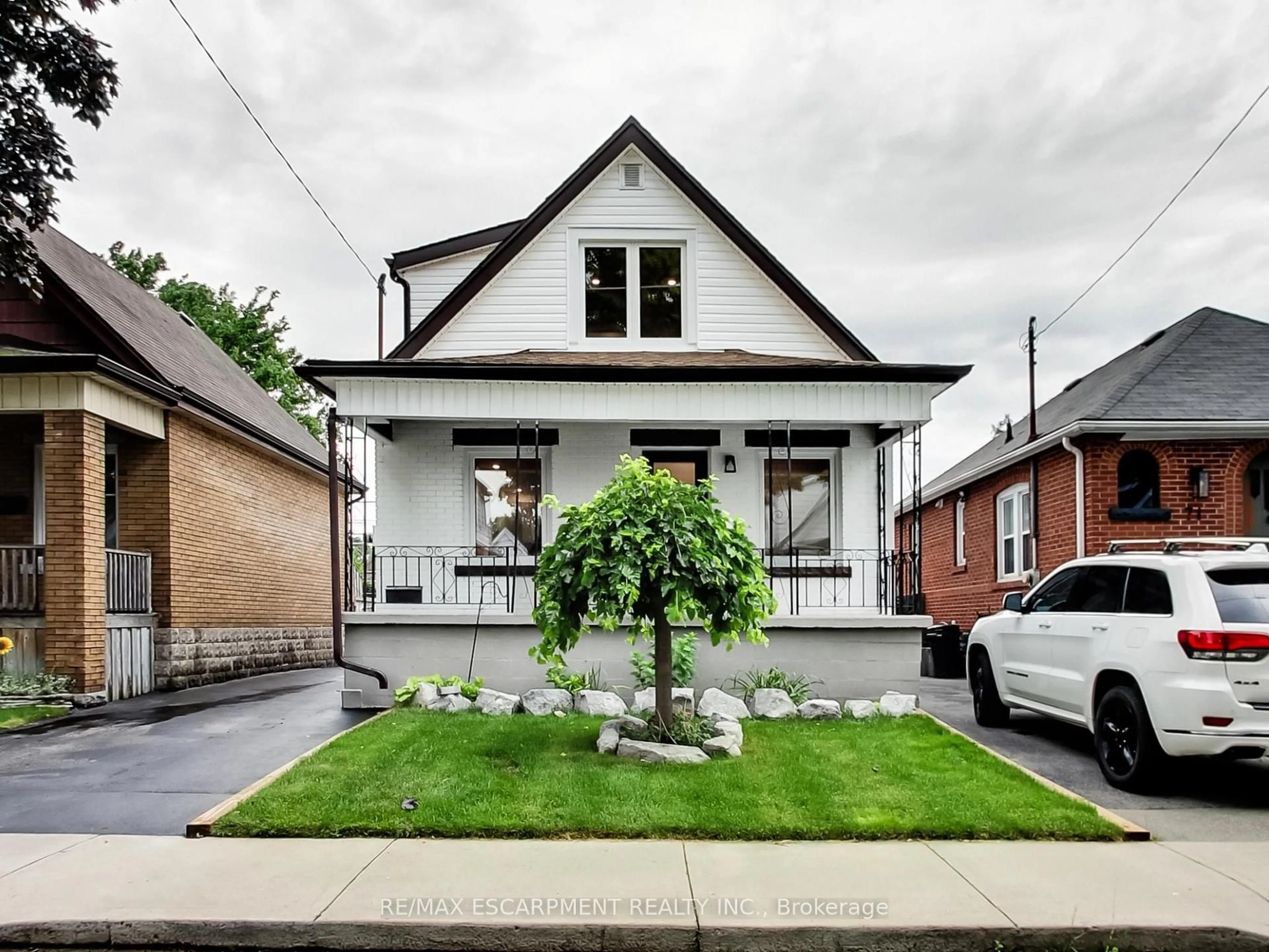Home with brick exterior material, street for 67 Cope St, Hamilton Ontario L8H 5B1