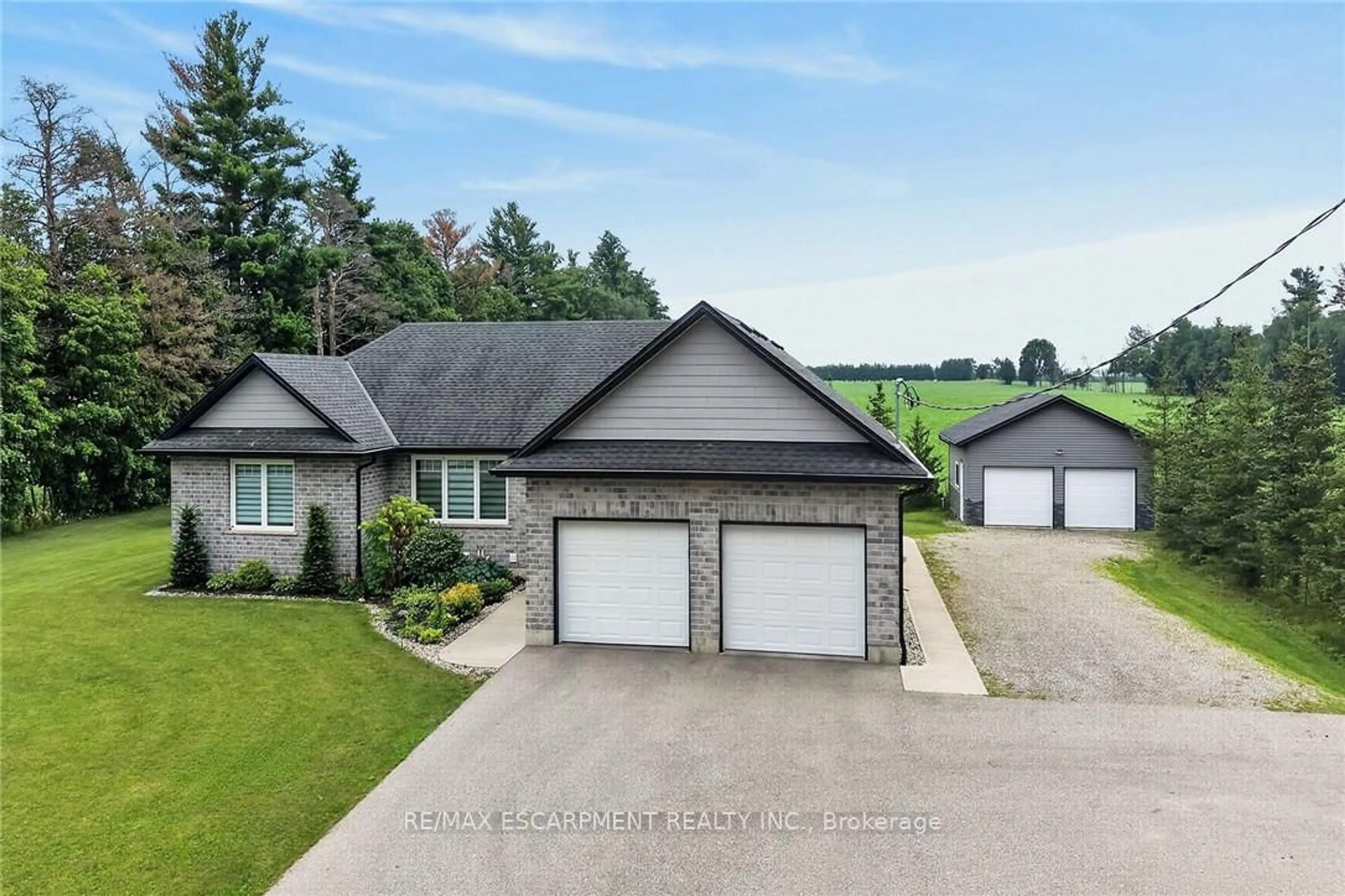 A pic from outside/outdoor area/front of a property/back of a property/a pic from drone, unknown for 1874 Windham Rd #7, Norfolk Ontario N0E 1V0