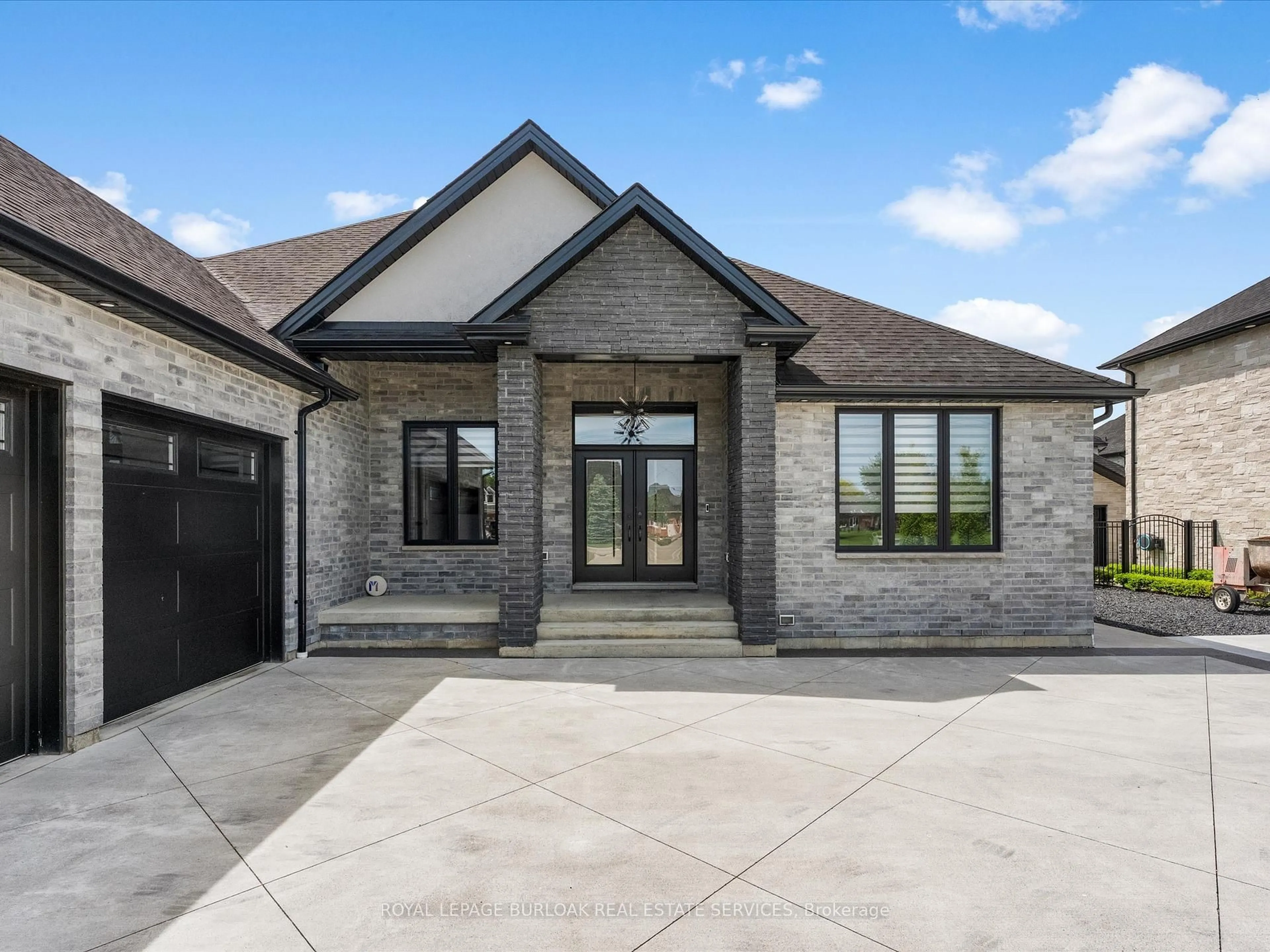 Home with brick exterior material, street for 351 Old Tecumseh Rd, Windsor Ontario N8N 3T2
