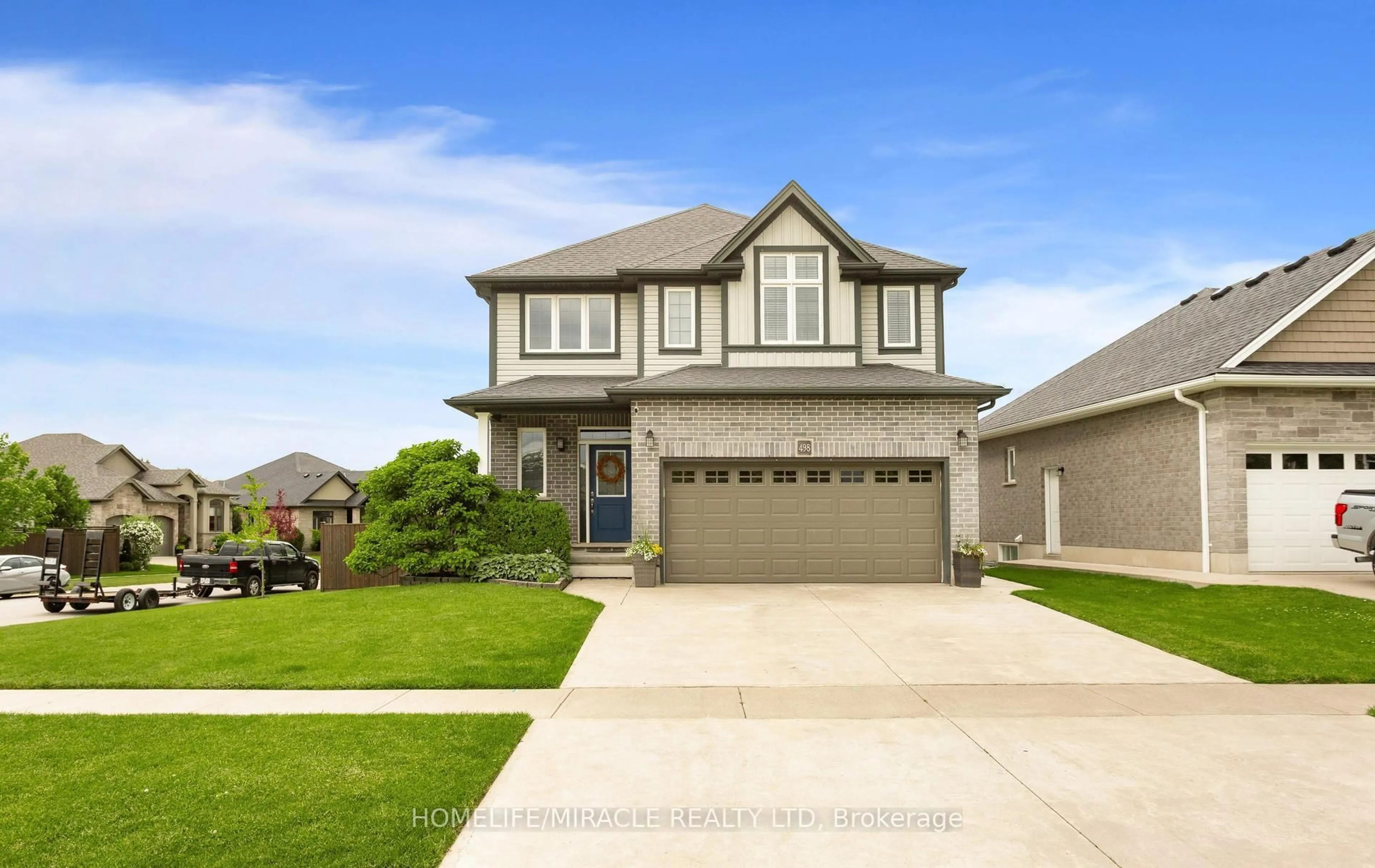 Home with vinyl exterior material, street for 498 Fairway Rd, Woodstock Ontario N4T 0J1