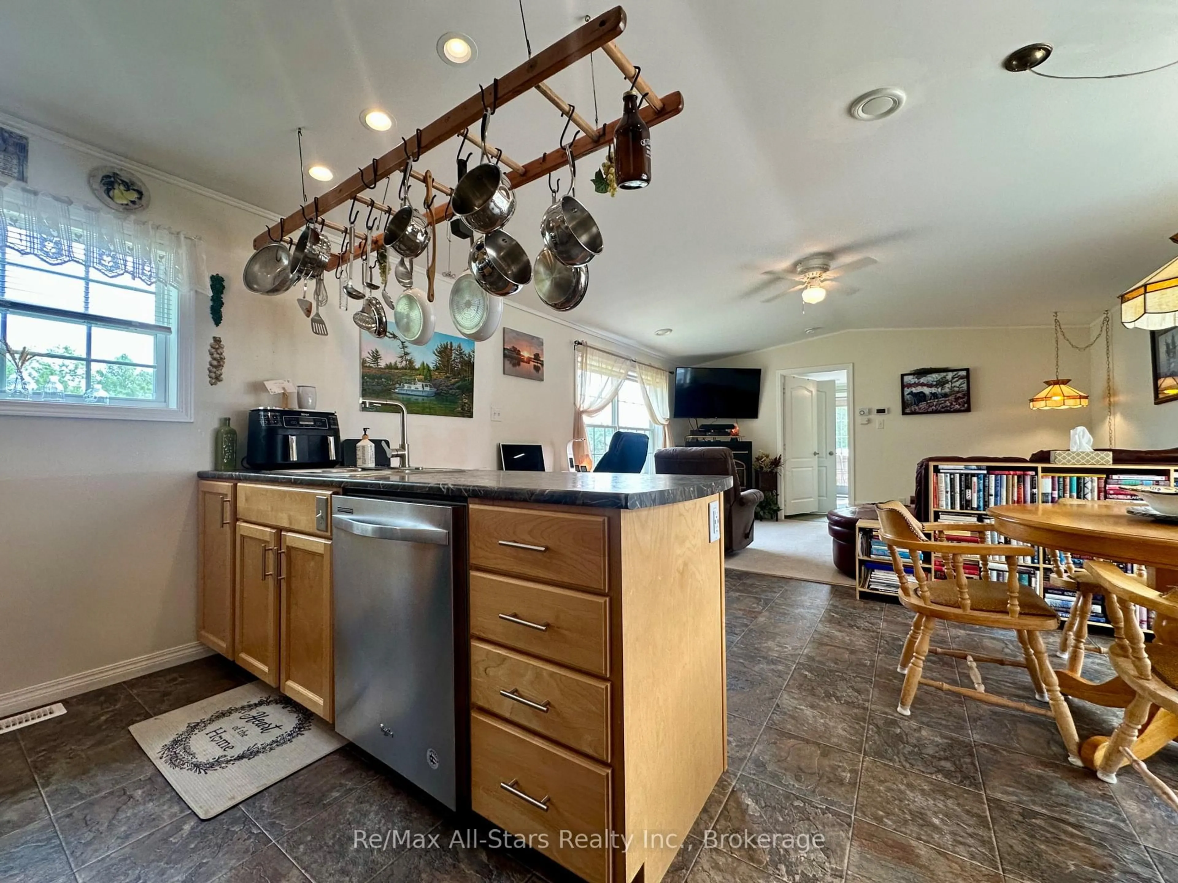 Open concept kitchen, ceramic/tile floor for 1007 Racoon Rd #129, Gravenhurst Ontario P1P 0C5