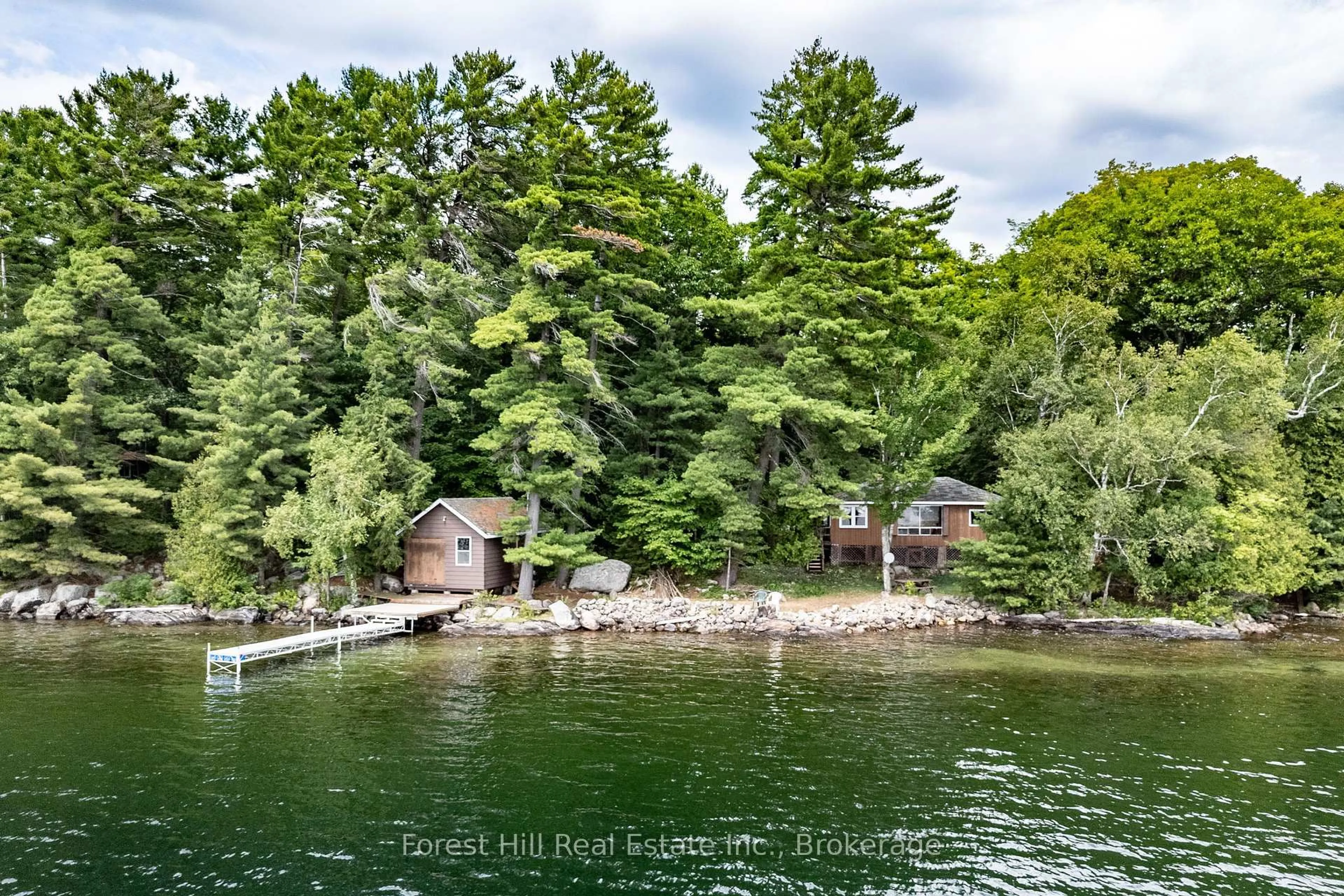 A pic from outside/outdoor area/front of a property/back of a property/a pic from drone, water/lake/river/ocean view for 191 Long Point Rd, Huntsville Ontario P0B 1M0