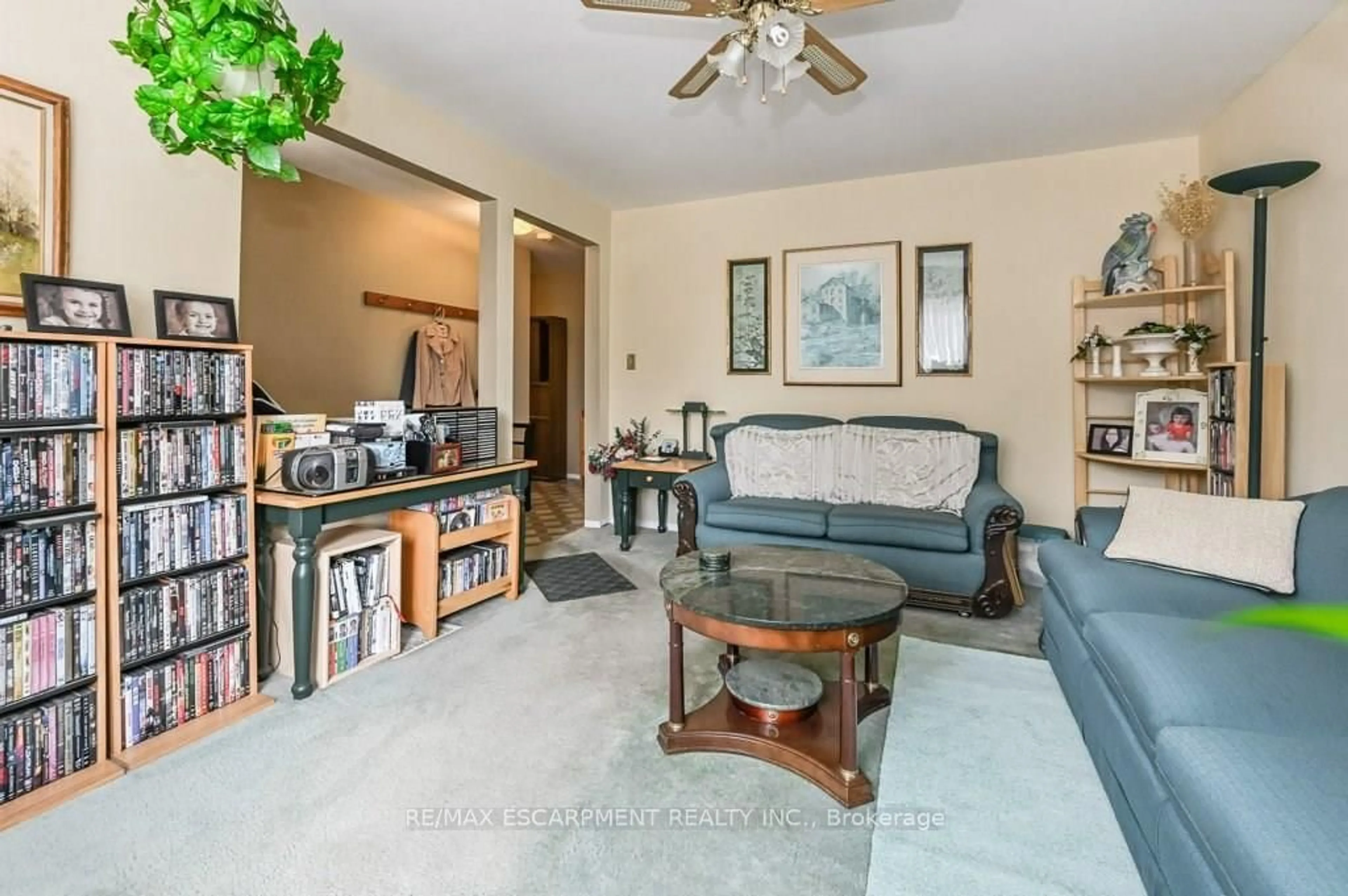 Living room with furniture, ceramic/tile floor for 641 Limeridge Rd, Hamilton Ontario L8W 1A2