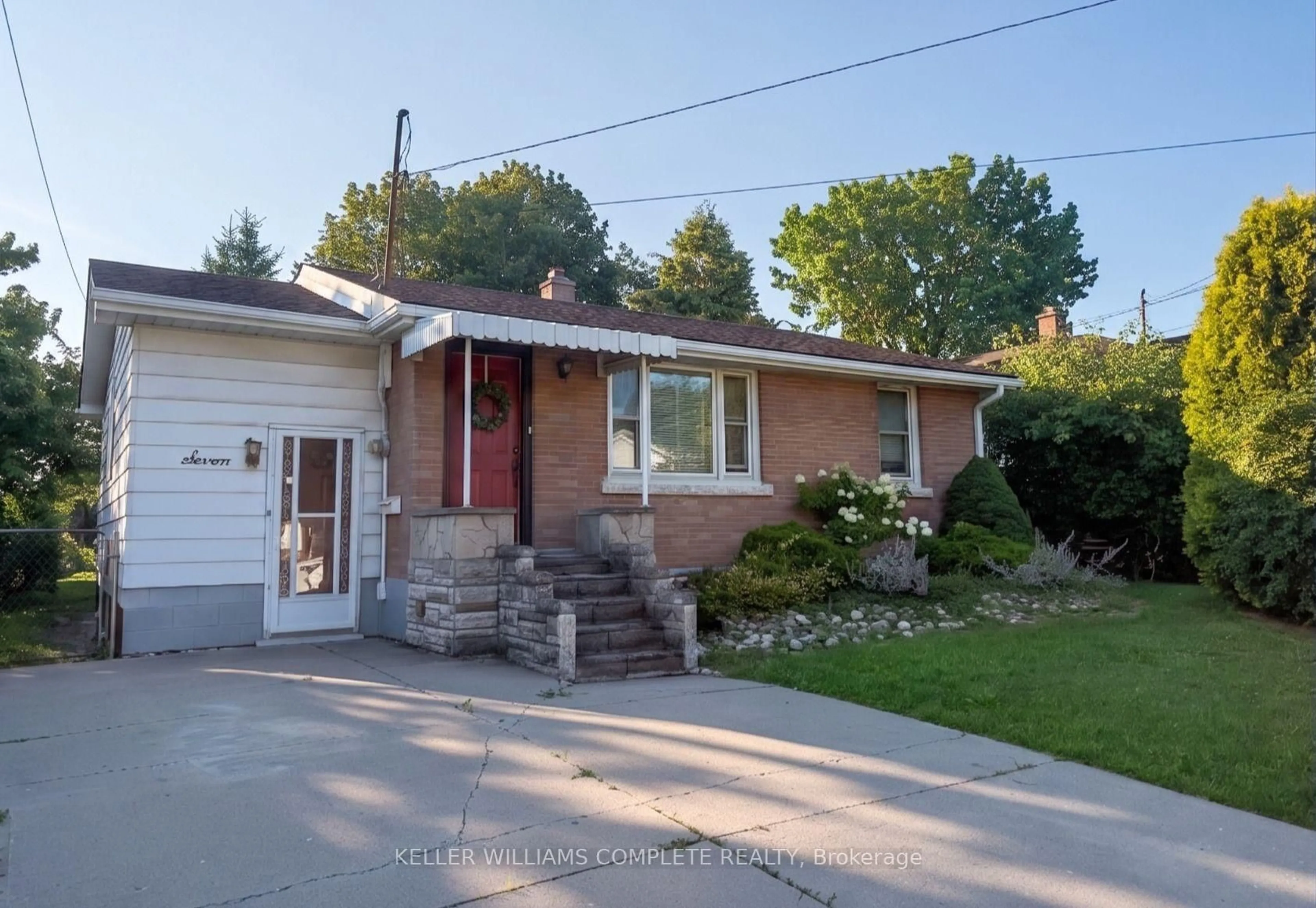 Home with brick exterior material, street for 7 West 1st St, Hamilton Ontario L9C 3B5
