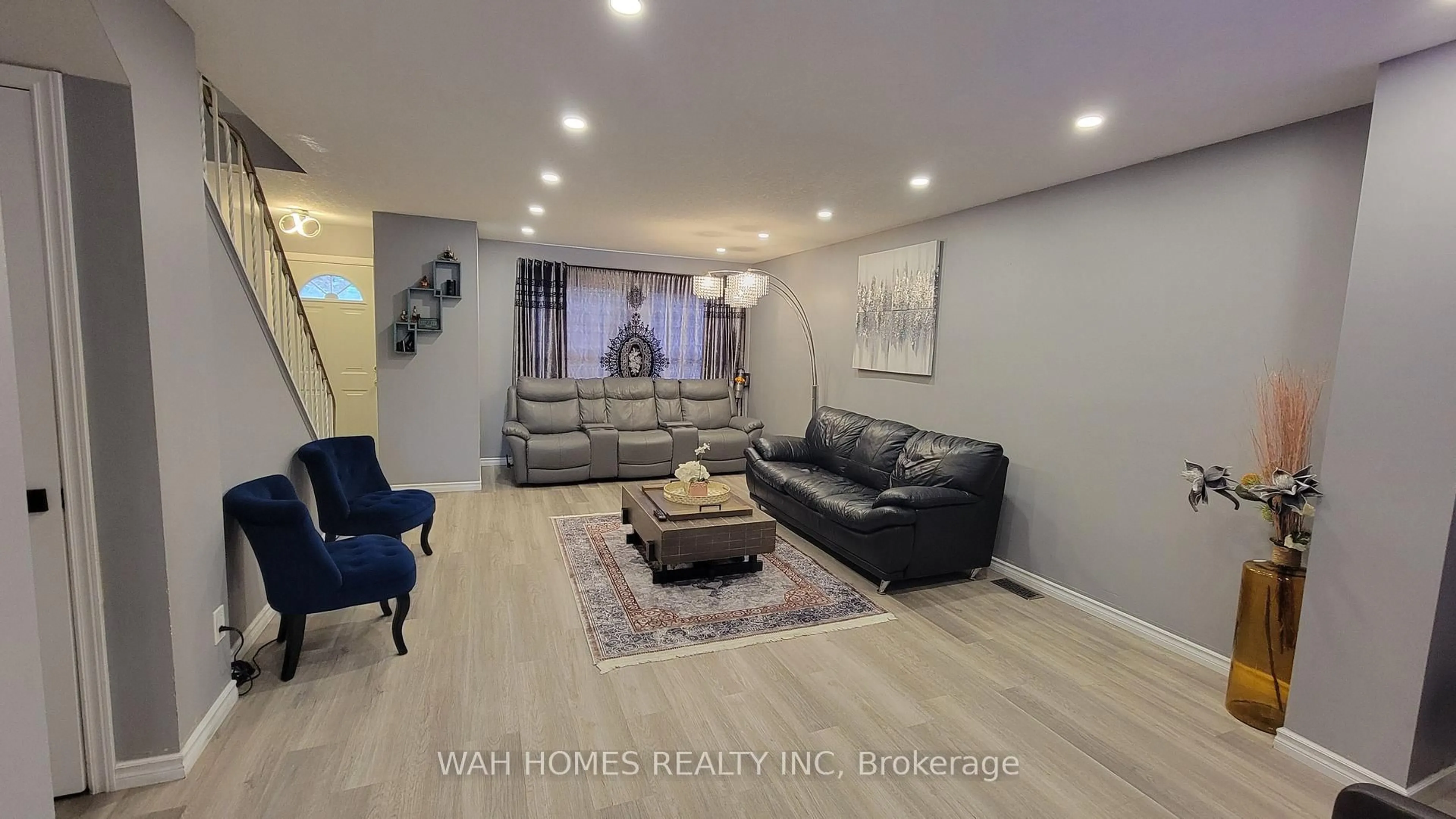 Living room with furniture, wood/laminate floor for 51 Sholto Dr #40, London South Ontario N6E 2H9