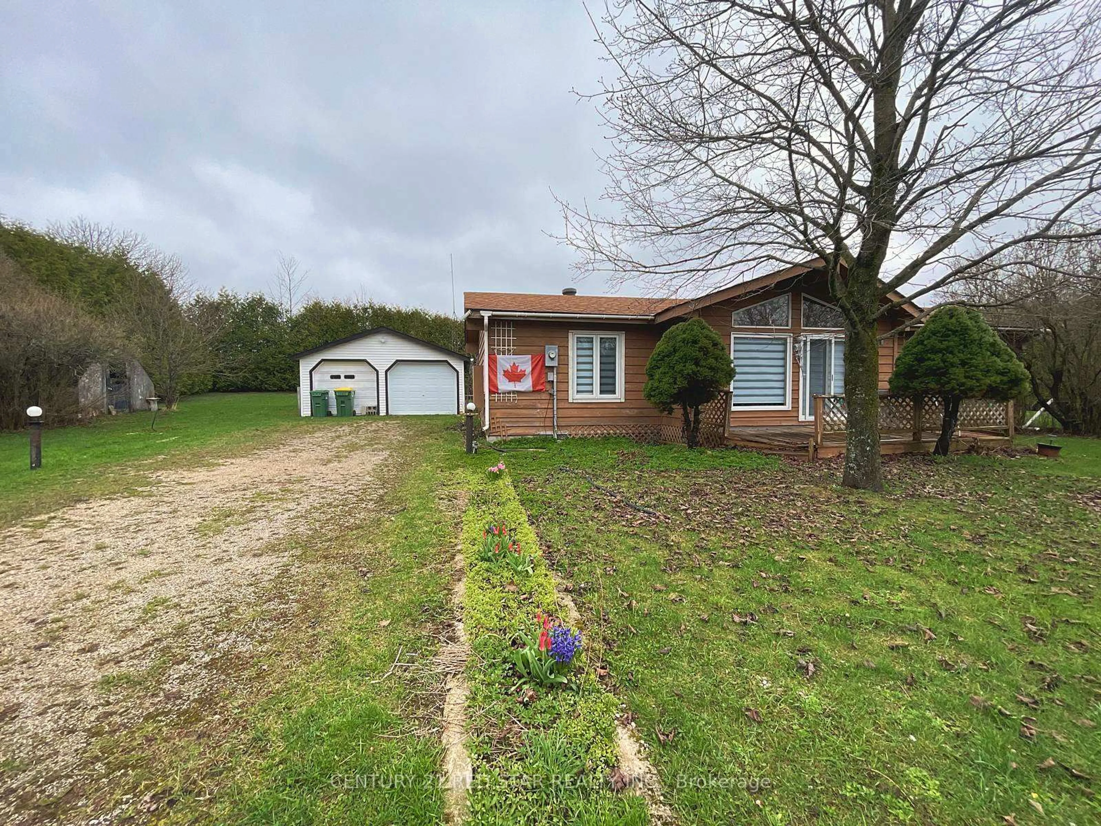 A pic from outside/outdoor area/front of a property/back of a property/a pic from drone, street for 209 Evans St, Grey Highlands Ontario N0C 1E0