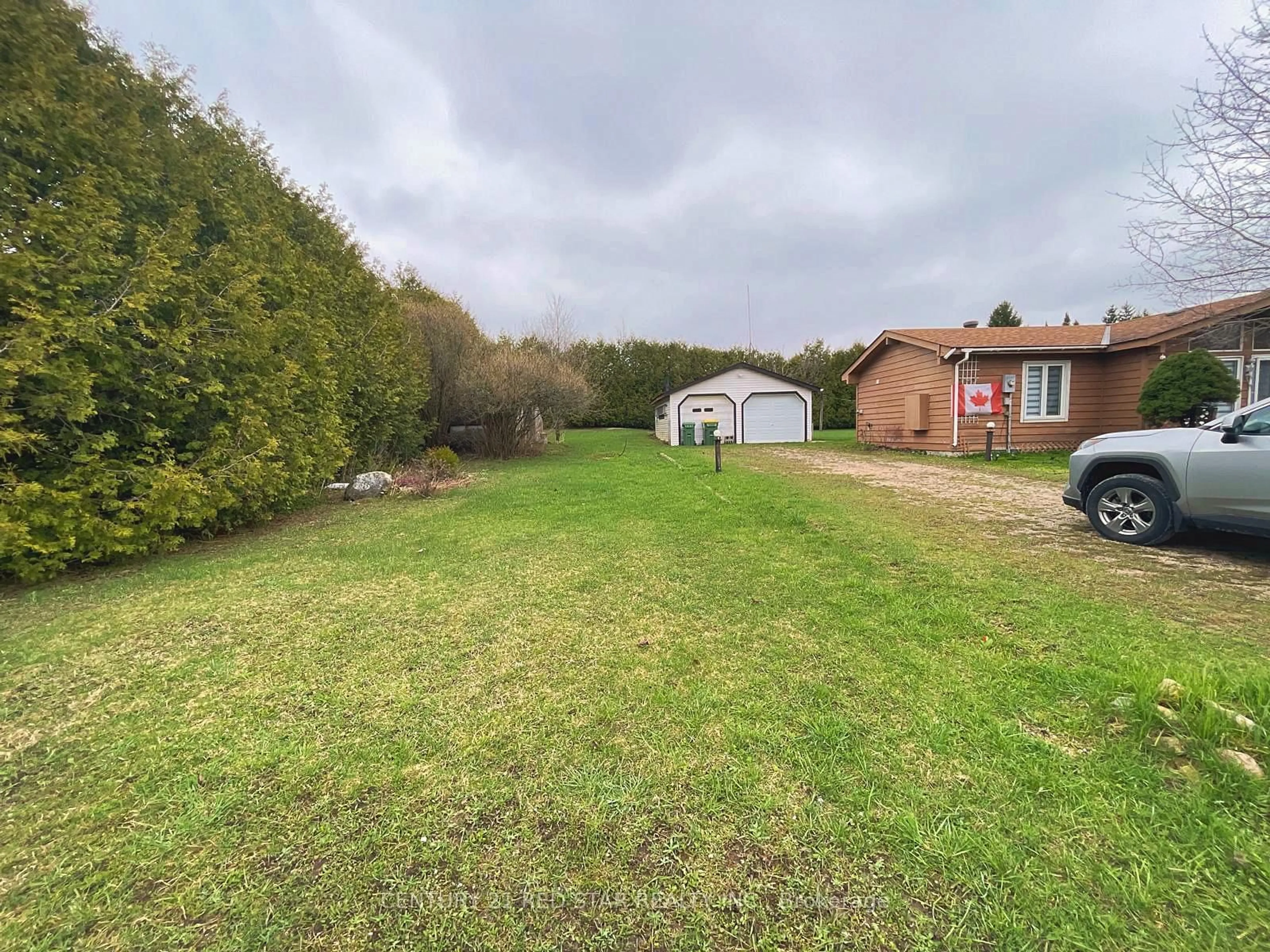 A pic from outside/outdoor area/front of a property/back of a property/a pic from drone, forest/trees view for 209 Evans St, Grey Highlands Ontario N0C 1E0