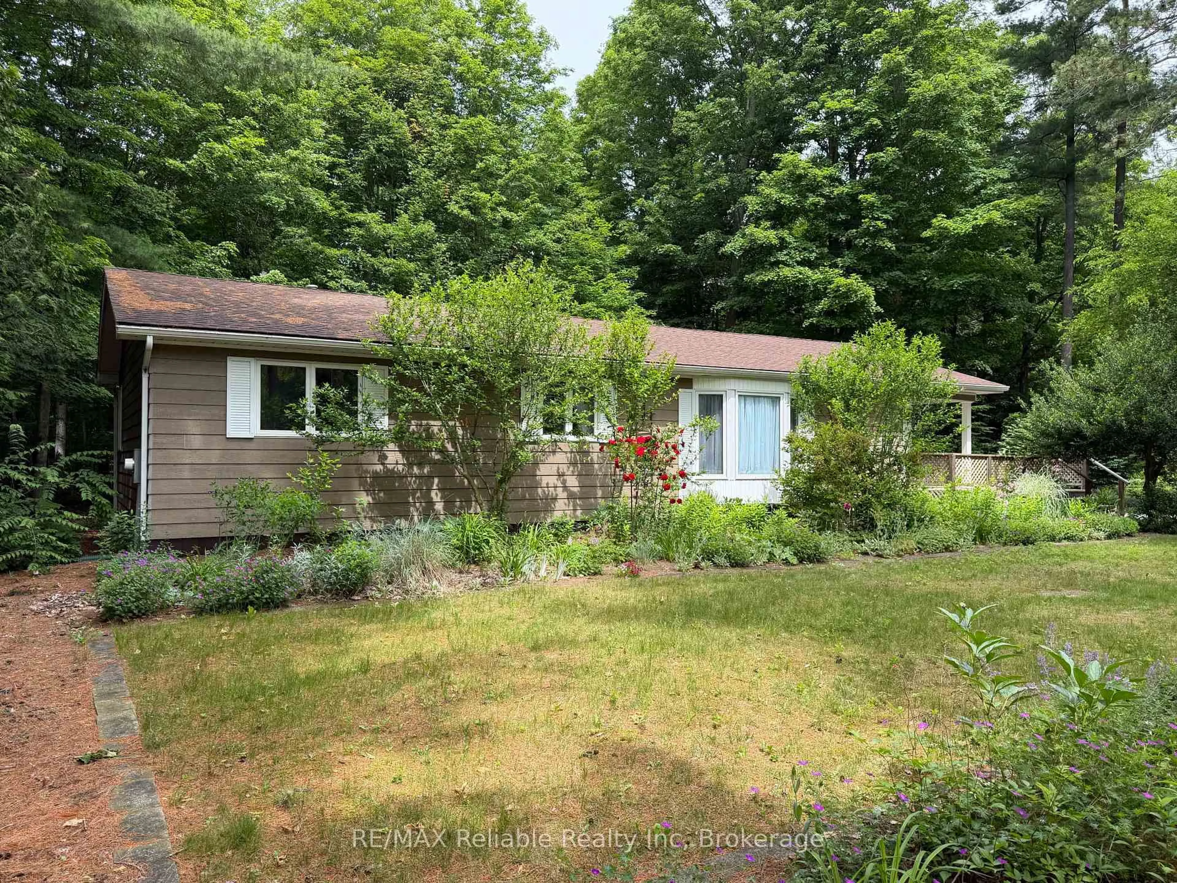 A pic from outside/outdoor area/front of a property/back of a property/a pic from drone, forest/trees view for 117 Tamarack Dr, Central Huron Ontario N0M 1G0