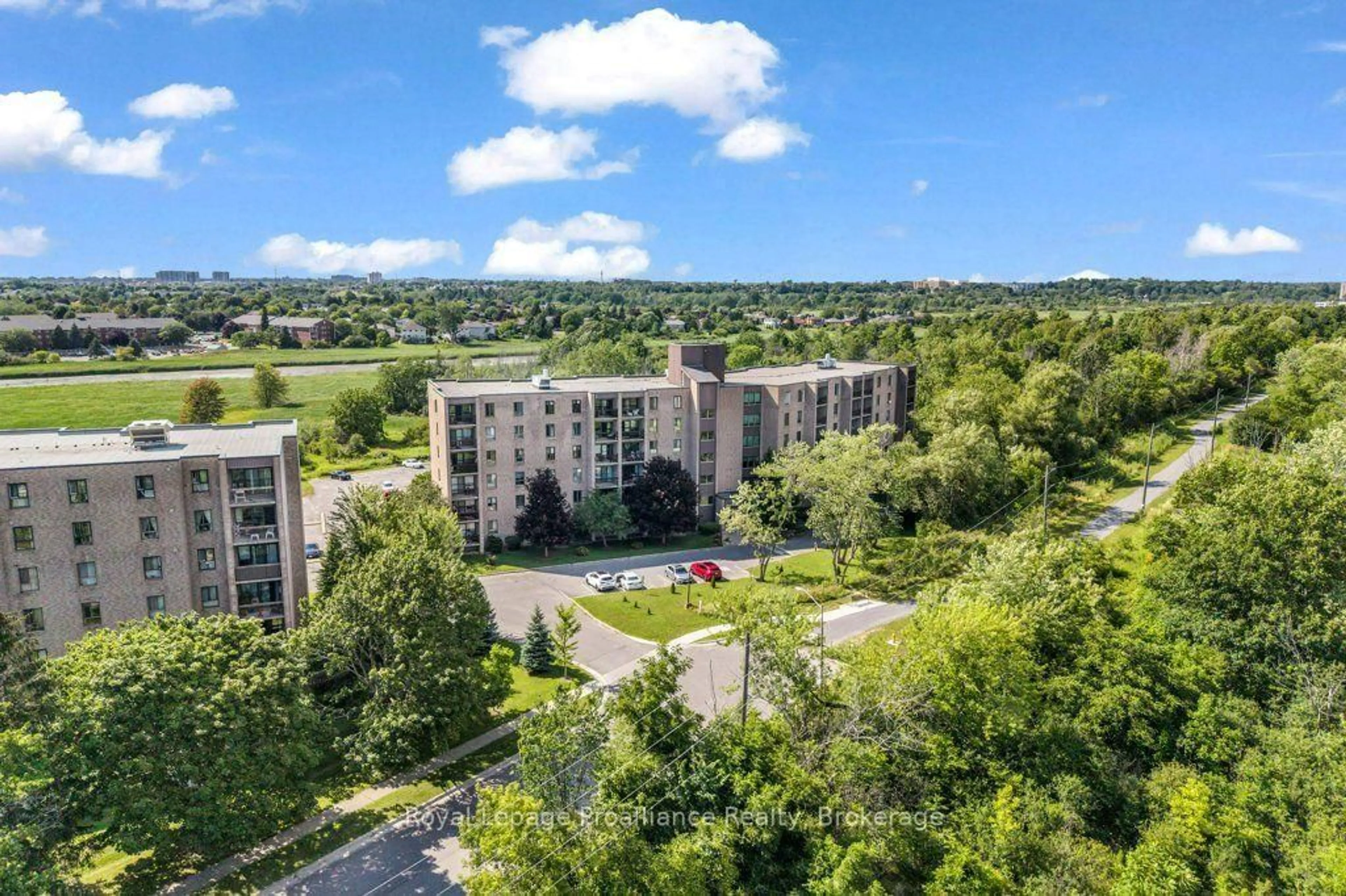 A pic from outside/outdoor area/front of a property/back of a property/a pic from drone, unknown for 358 Queen Mary Rd #509, Kingston Ontario K7M 7E8