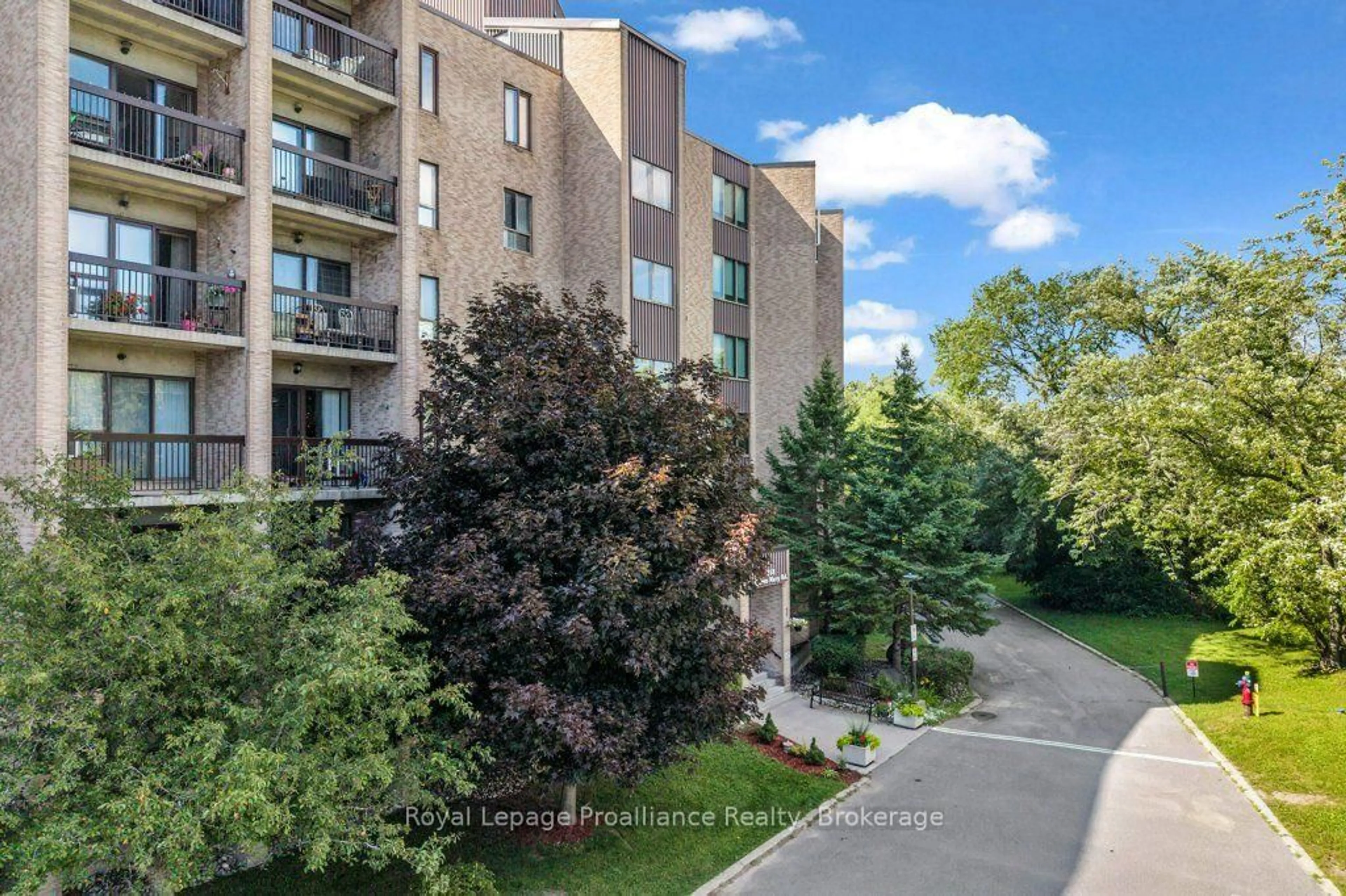 A pic from outside/outdoor area/front of a property/back of a property/a pic from drone, unknown for 358 Queen Mary Rd #509, Kingston Ontario K7M 7E8