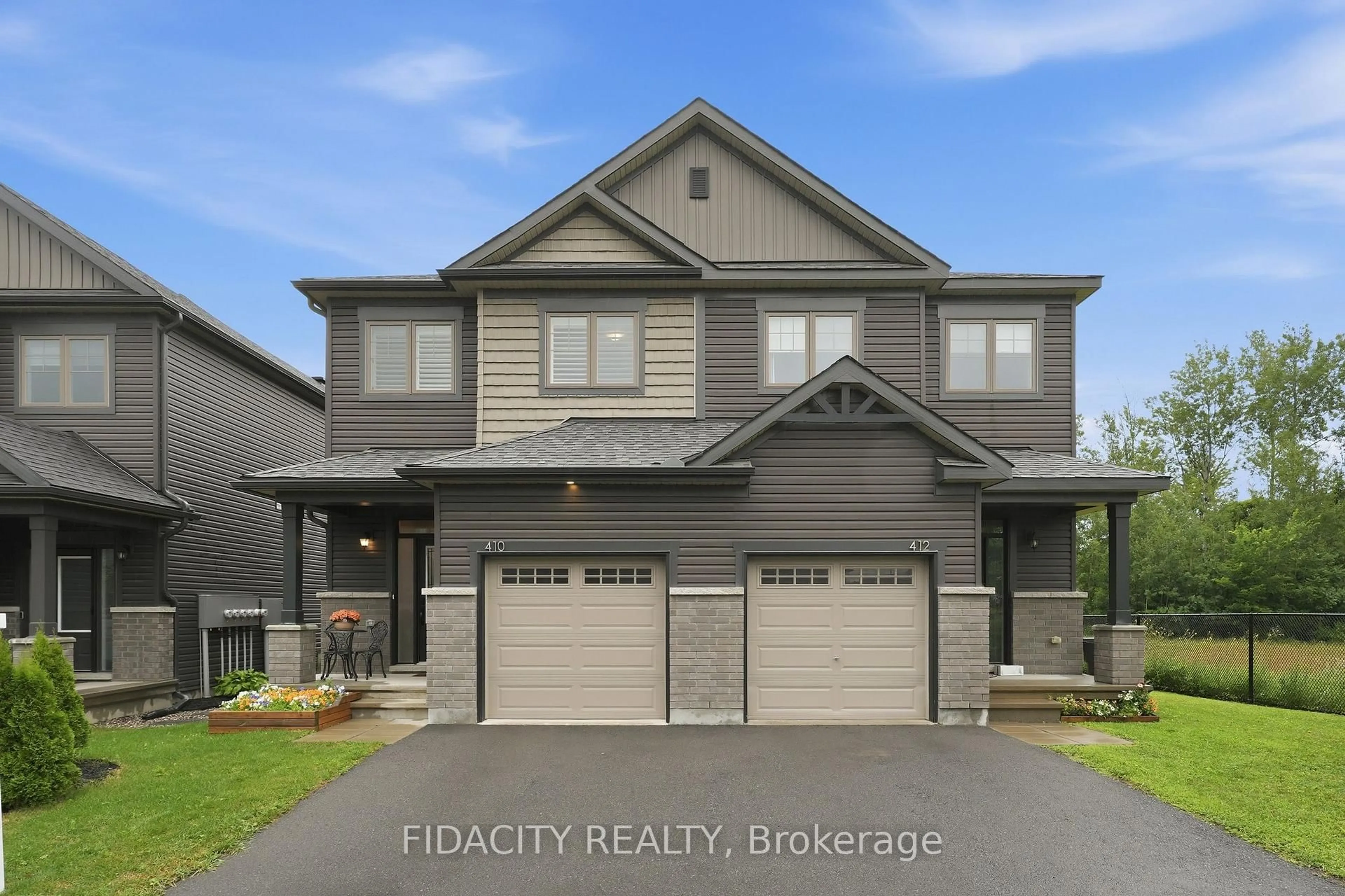 Home with brick exterior material, street for 410 Premiere Lane, Clarence-Rockland Ontario K4K 0M7