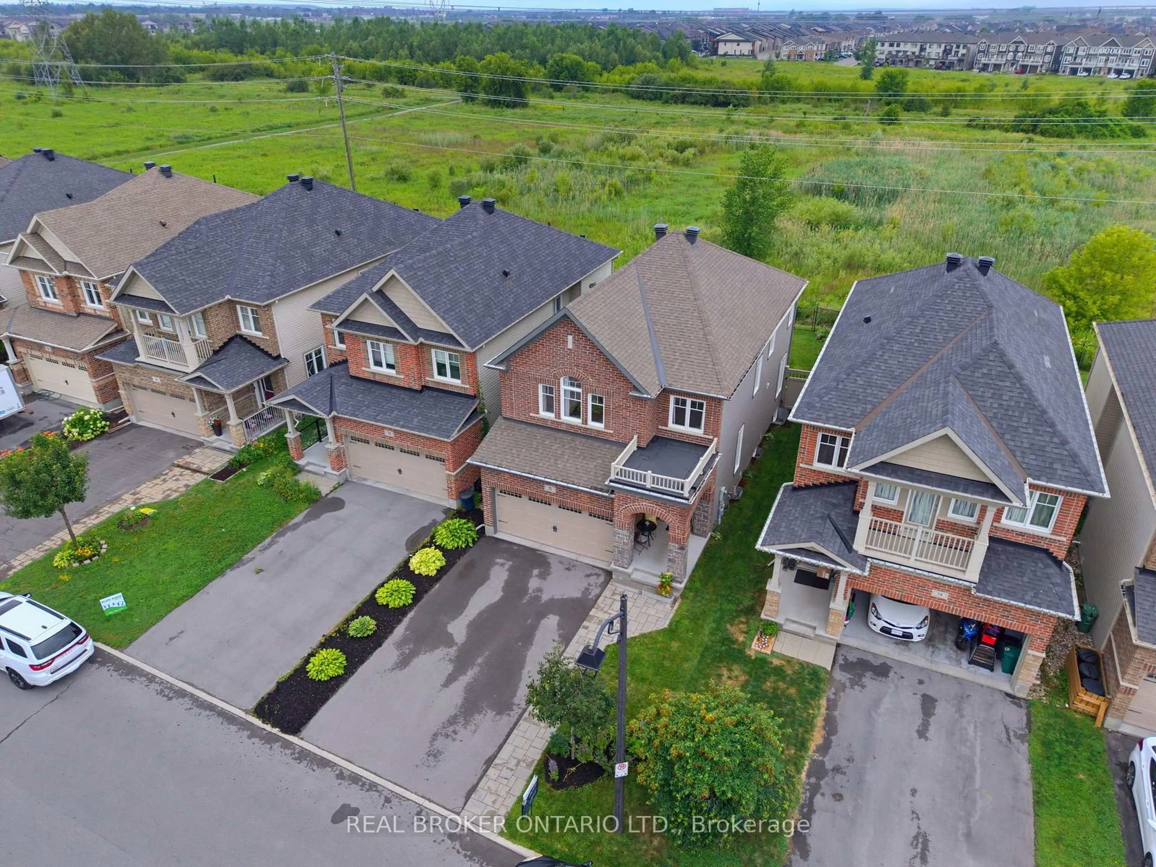 A pic from outside/outdoor area/front of a property/back of a property/a pic from drone, street for 76 Tapadero Ave, Ottawa Ontario K2S 1E7