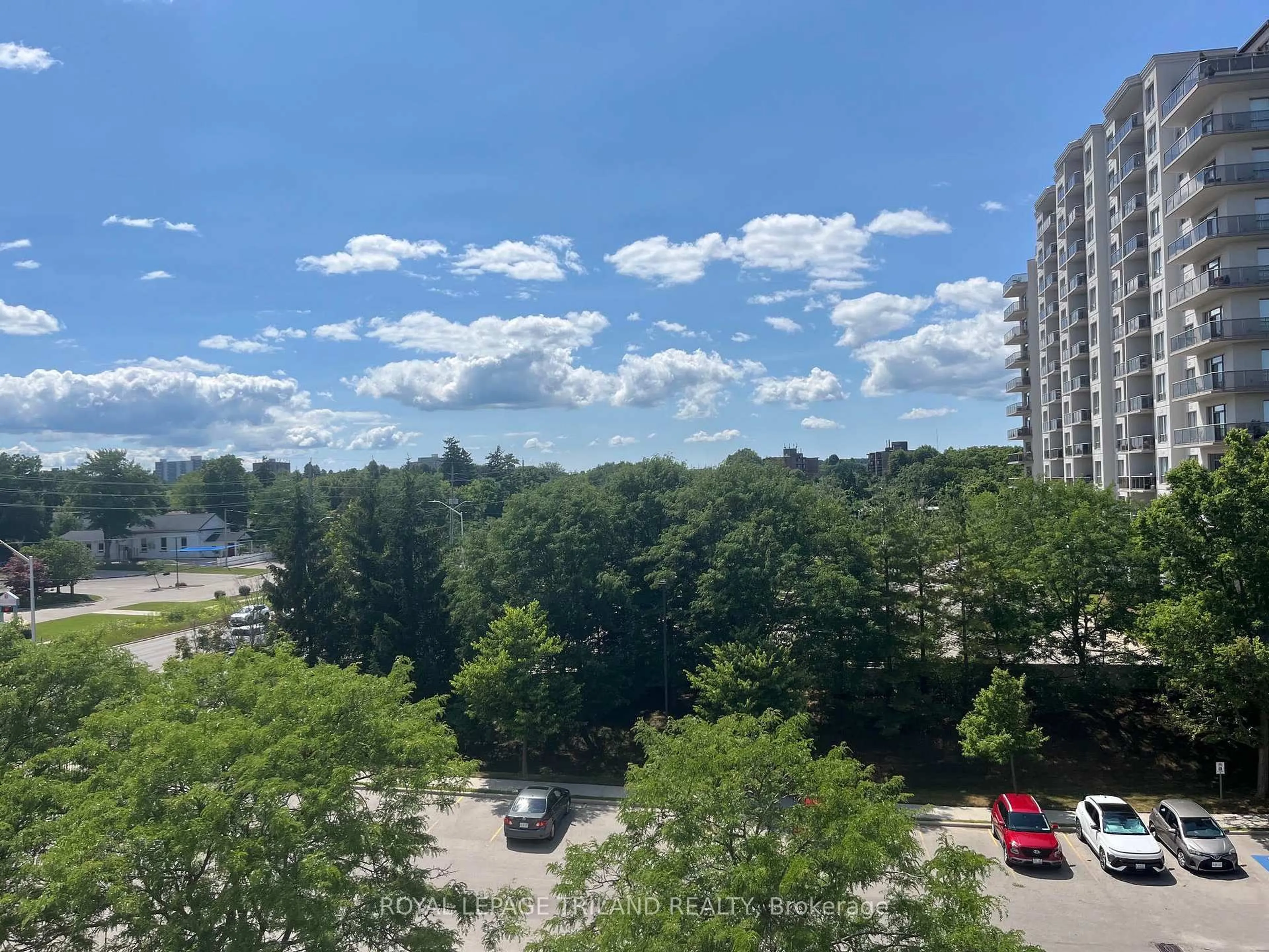 A pic from outside/outdoor area/front of a property/back of a property/a pic from drone, city buildings view from balcony for 333 Commissioners Rd #505, London South Ontario N6J 4X7