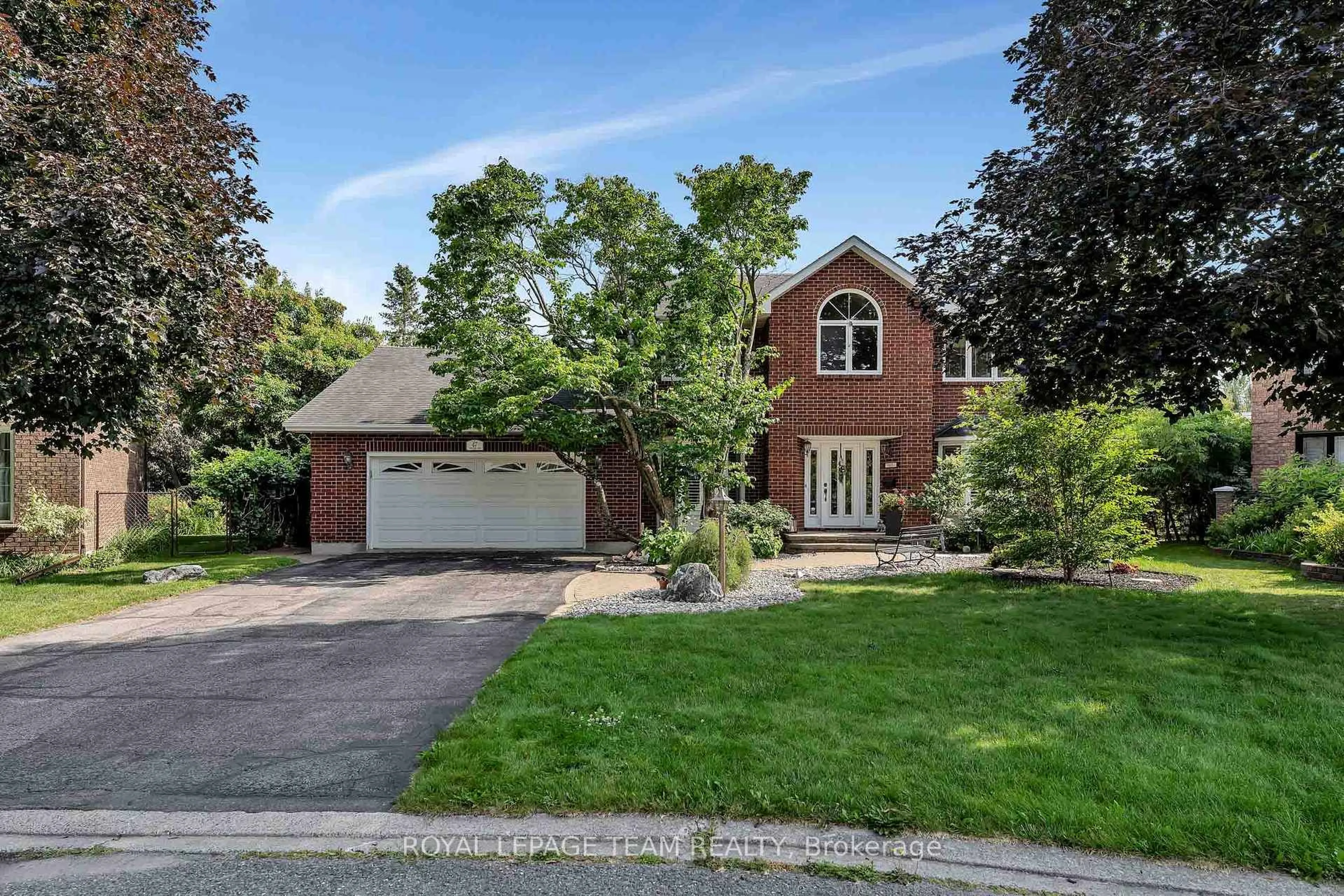 Home with brick exterior material, street for 47 Stapledon Cres, Ottawa Ontario K2H 9L3