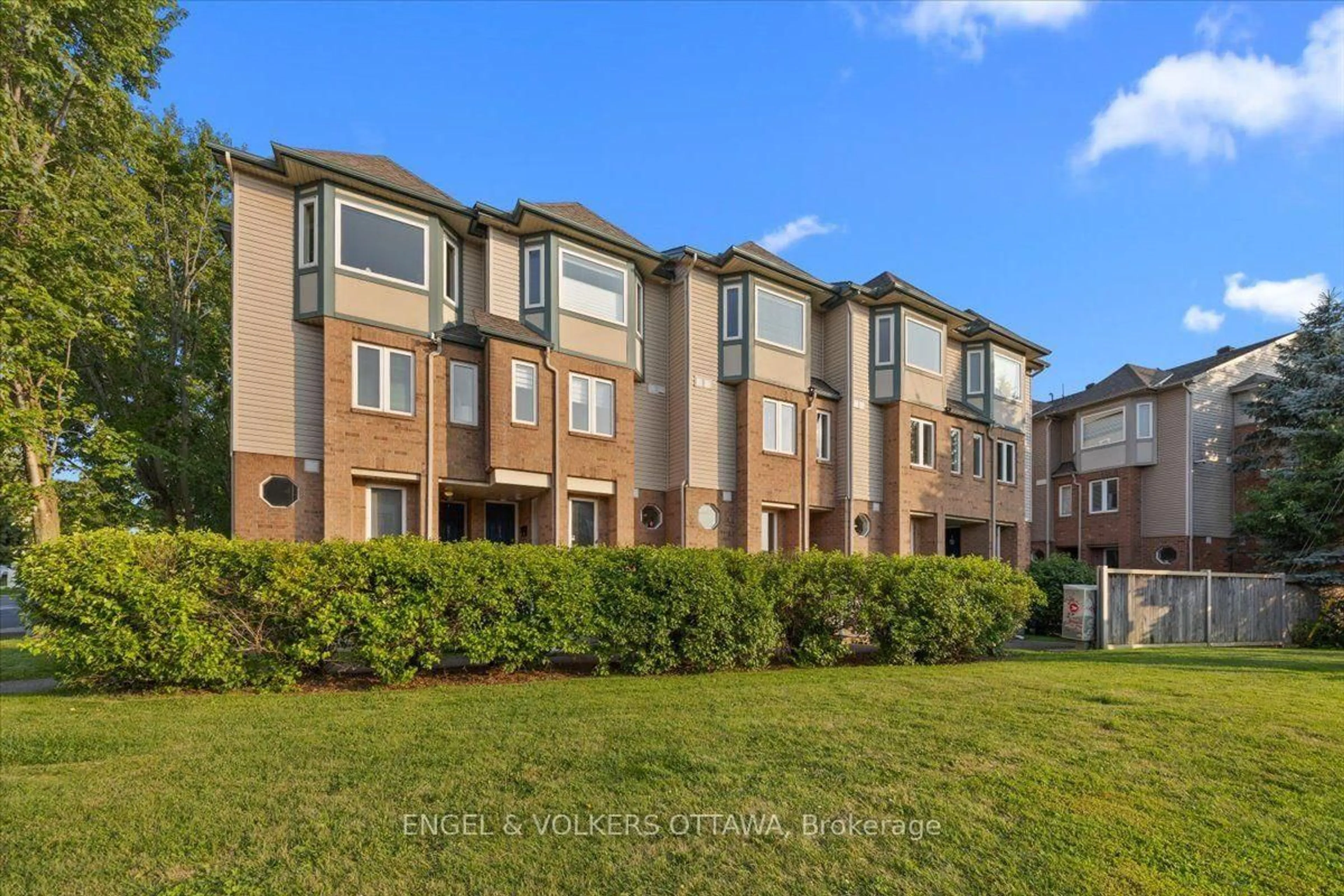 A pic from outside/outdoor area/front of a property/back of a property/a pic from drone, unknown for 2820 Baseline Rd #9, Ottawa Ontario K2H 1G9