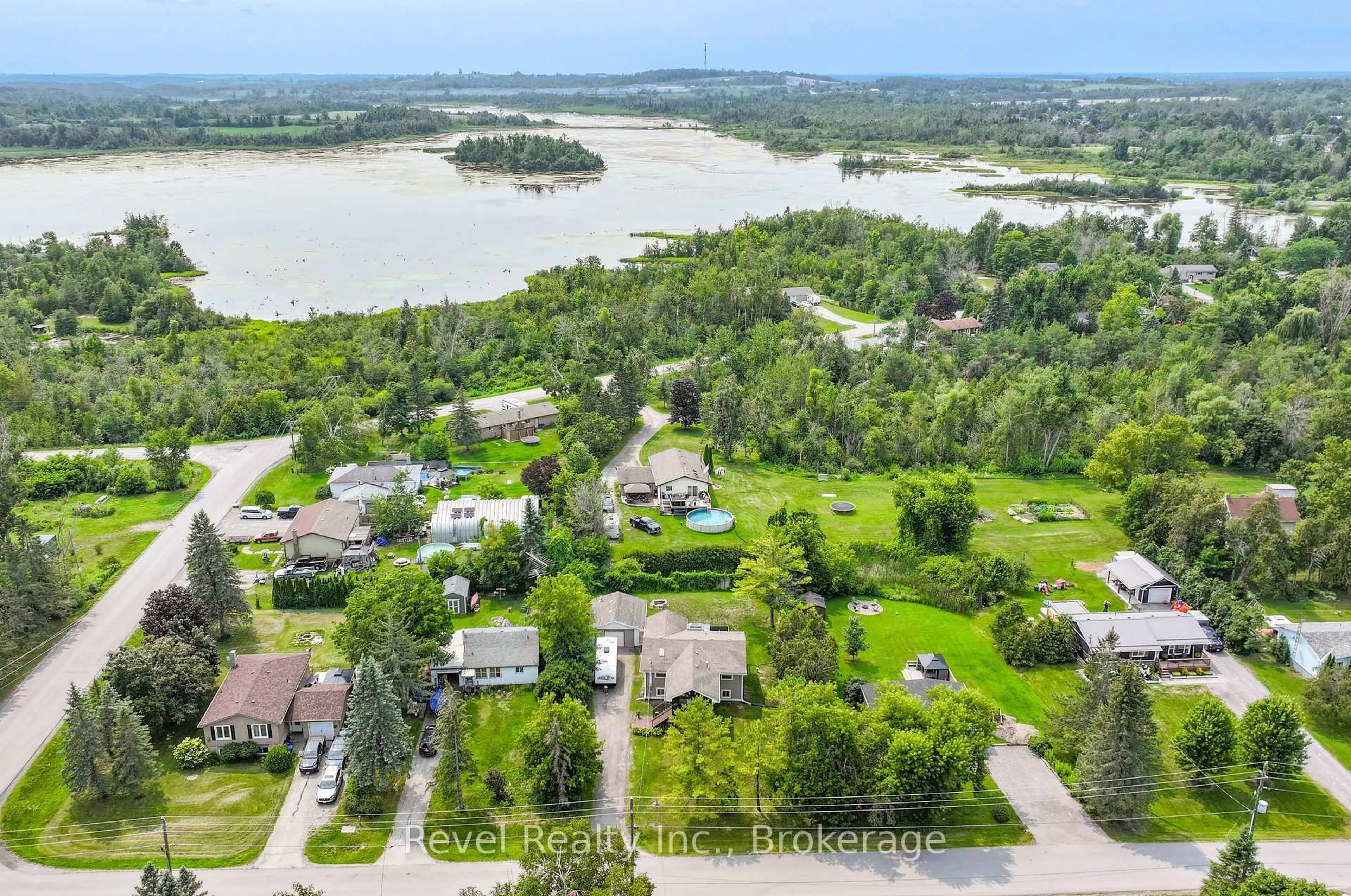 A pic from outside/outdoor area/front of a property/back of a property/a pic from drone, water/lake/river/ocean view for 81 Queen St, Kawartha Lakes Ontario K0L 2W0
