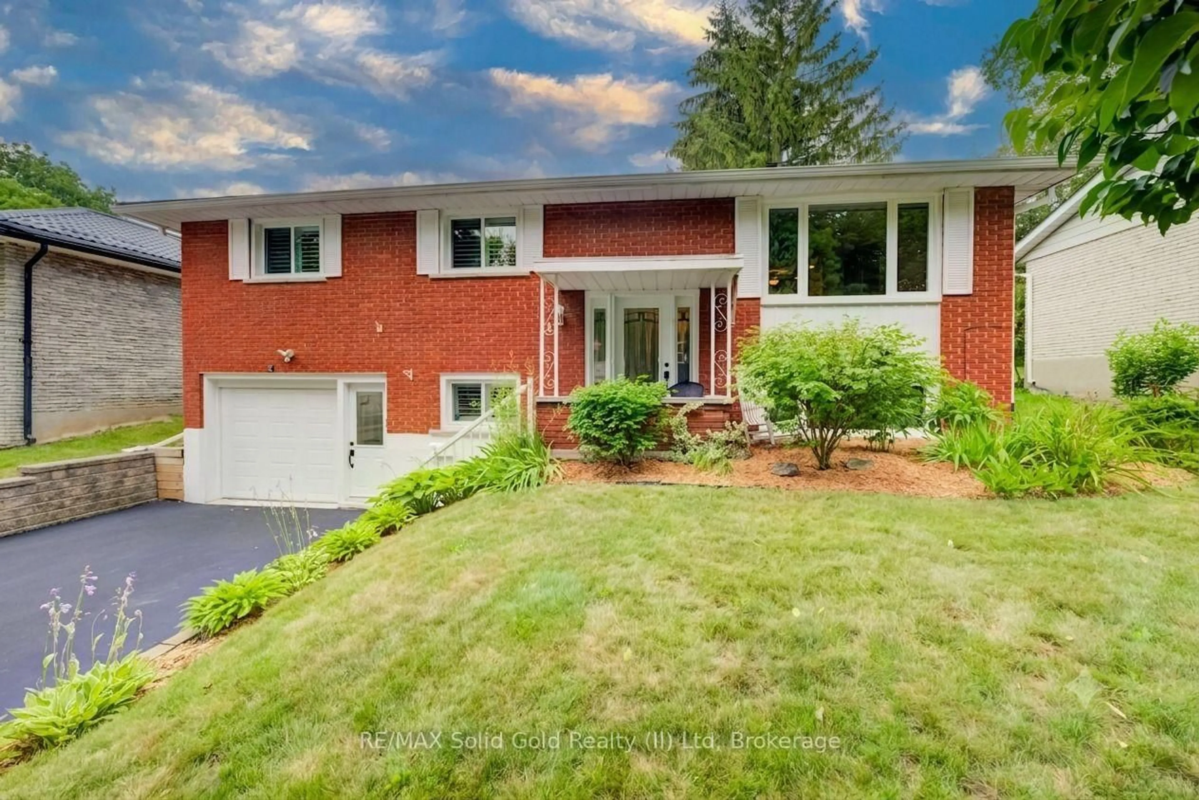 Home with brick exterior material, street for 21 Kelly Dr, Kitchener Ontario N2M 1V7