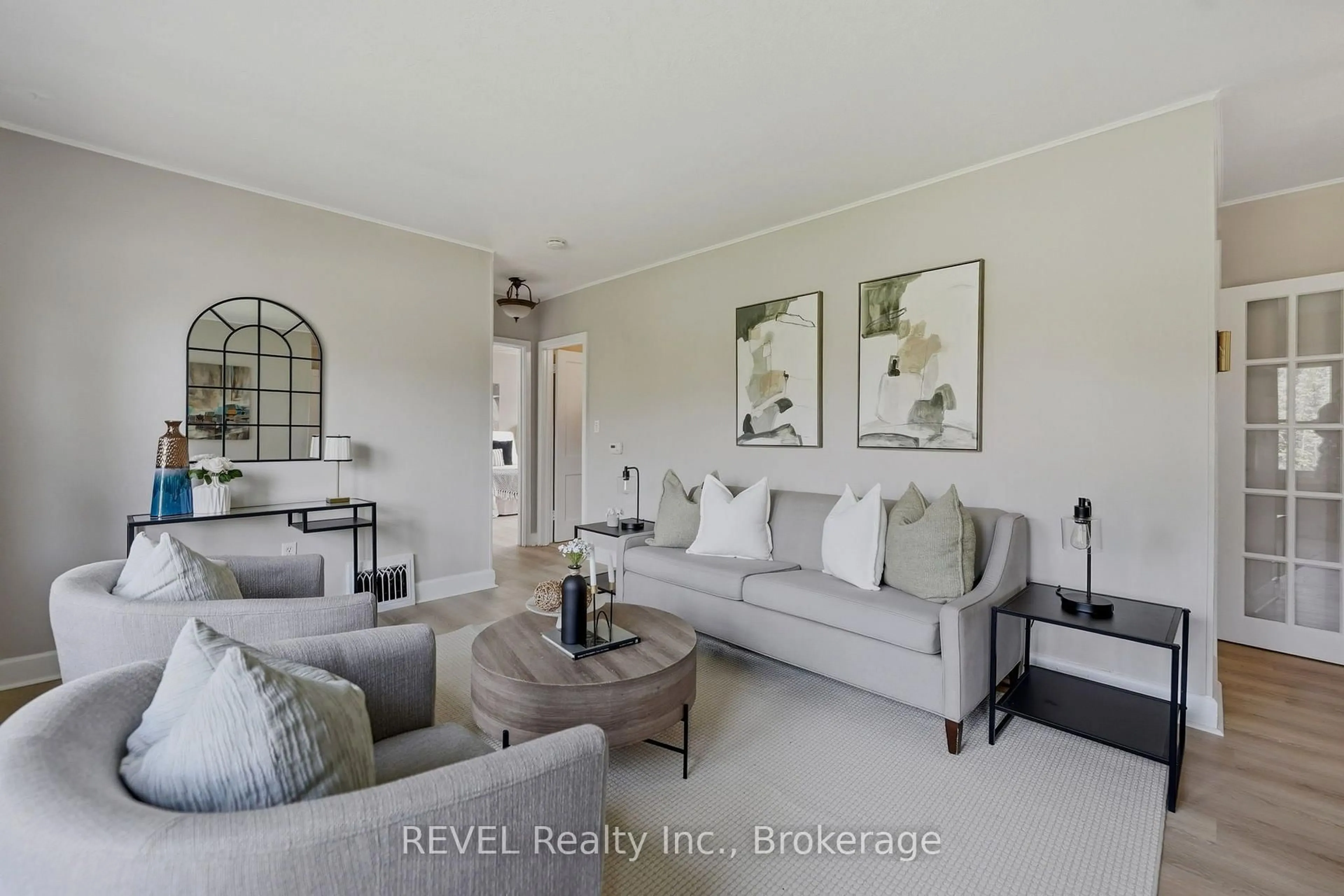 Living room with furniture, ceramic/tile floor for 7962 Booth St, Niagara Falls Ontario L2H 1E8