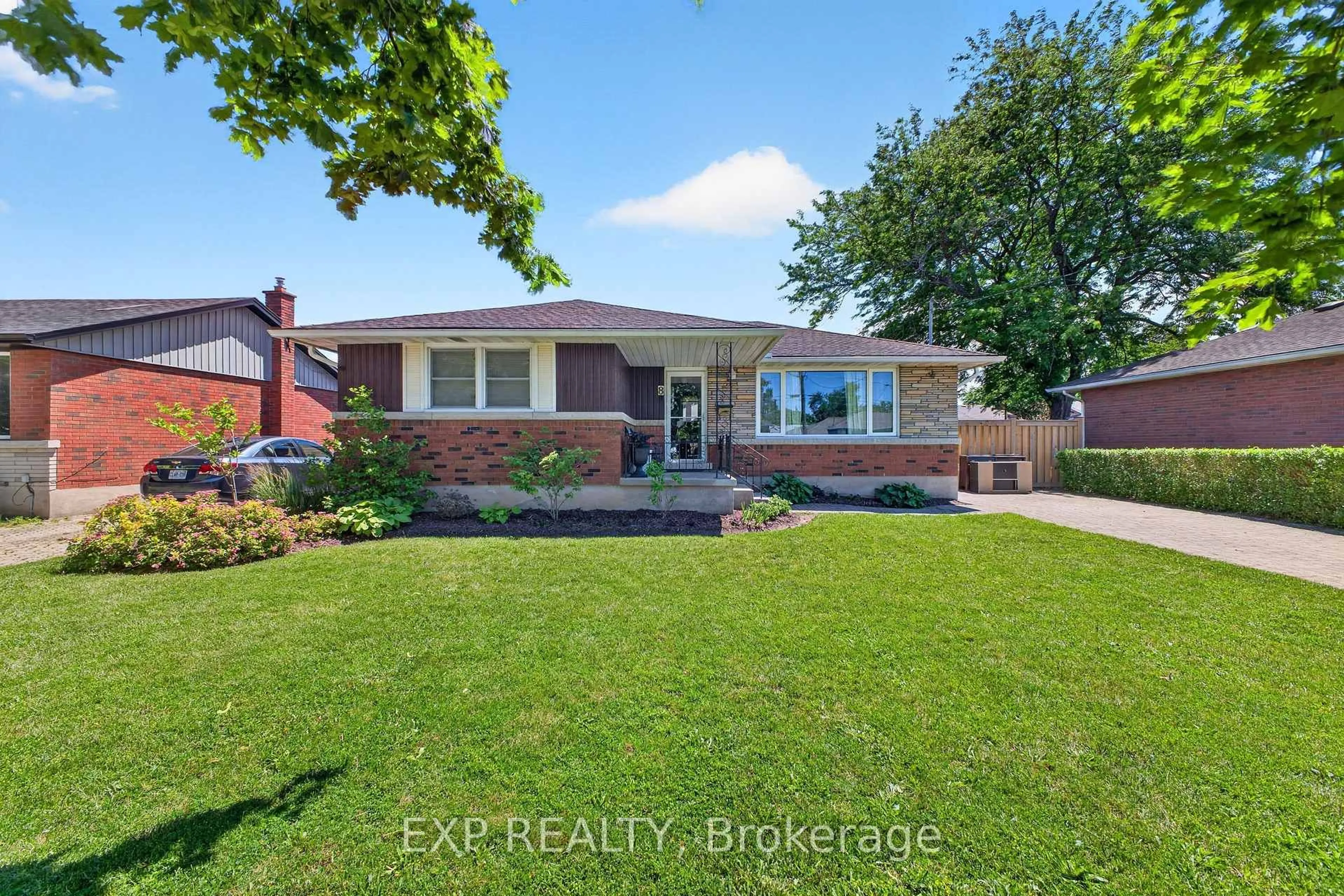 Home with brick exterior material, street for 8 Dunraven Ave, St. Catharines Ontario L2M 6A7
