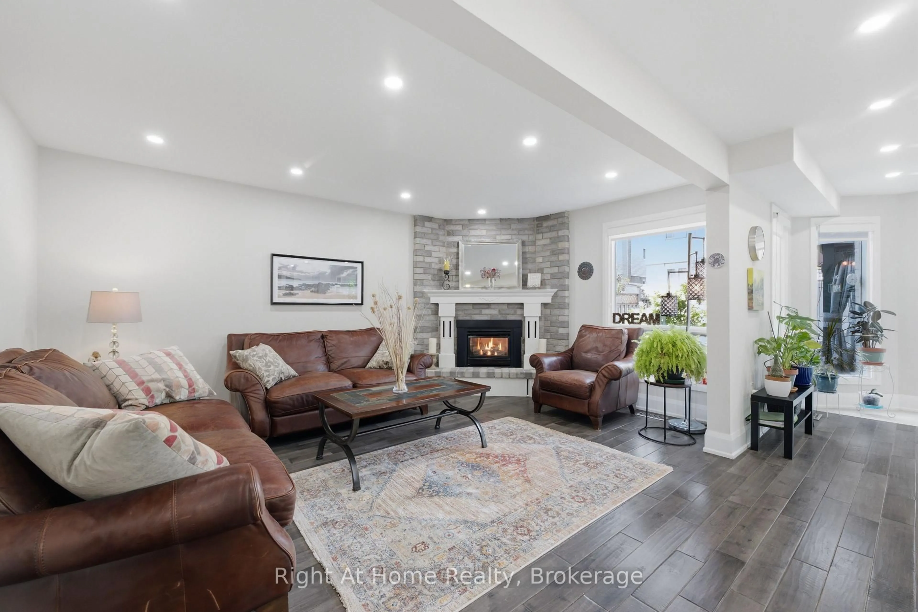 Living room with furniture, ceramic/tile floor for 197 Parkwood Cres, Hamilton Ontario L8V 4Z3
