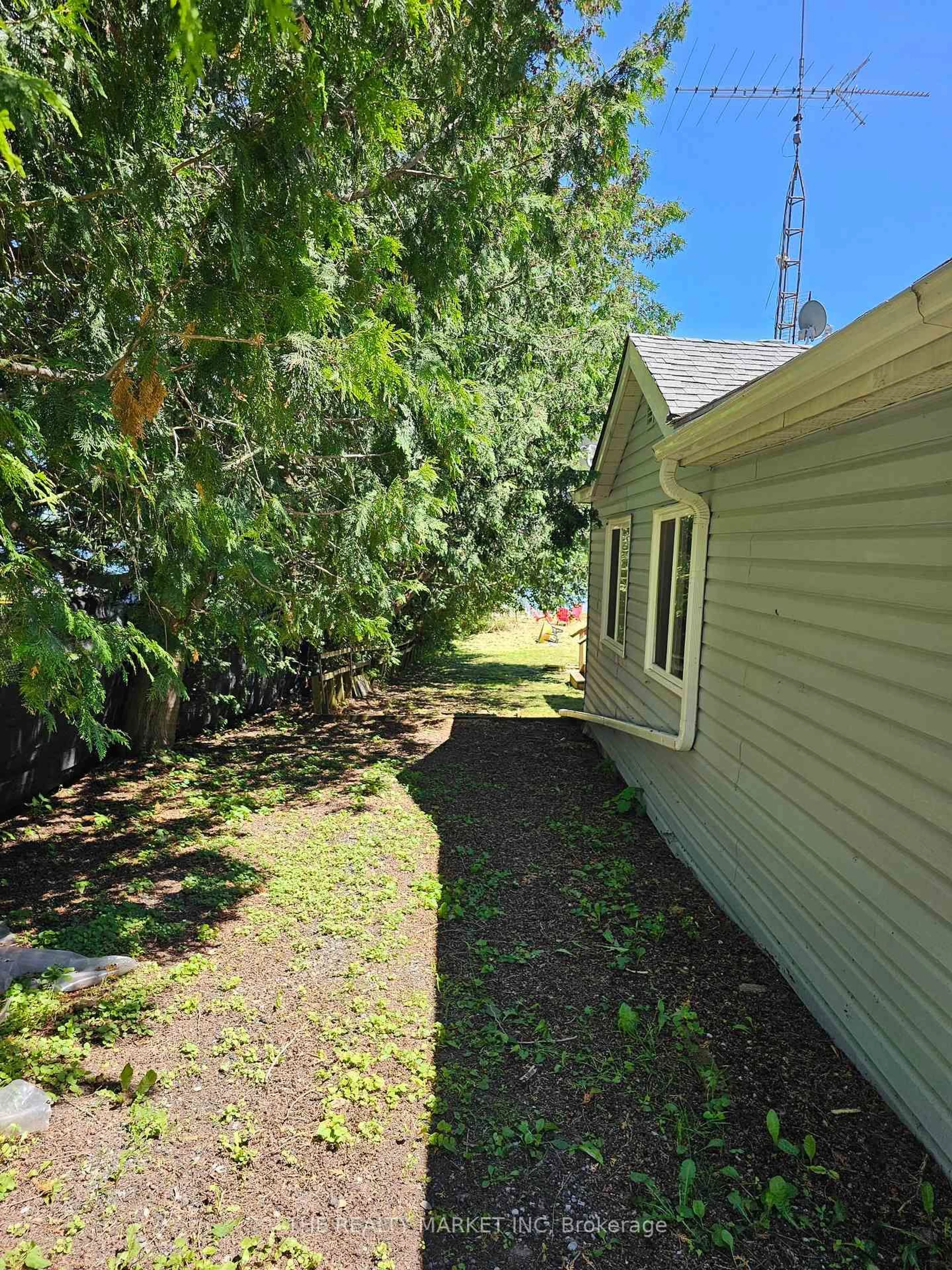 A pic from outside/outdoor area/front of a property/back of a property/a pic from drone, unknown for 30 Beach Rd, Kawartha Lakes Ontario K0M 2C0
