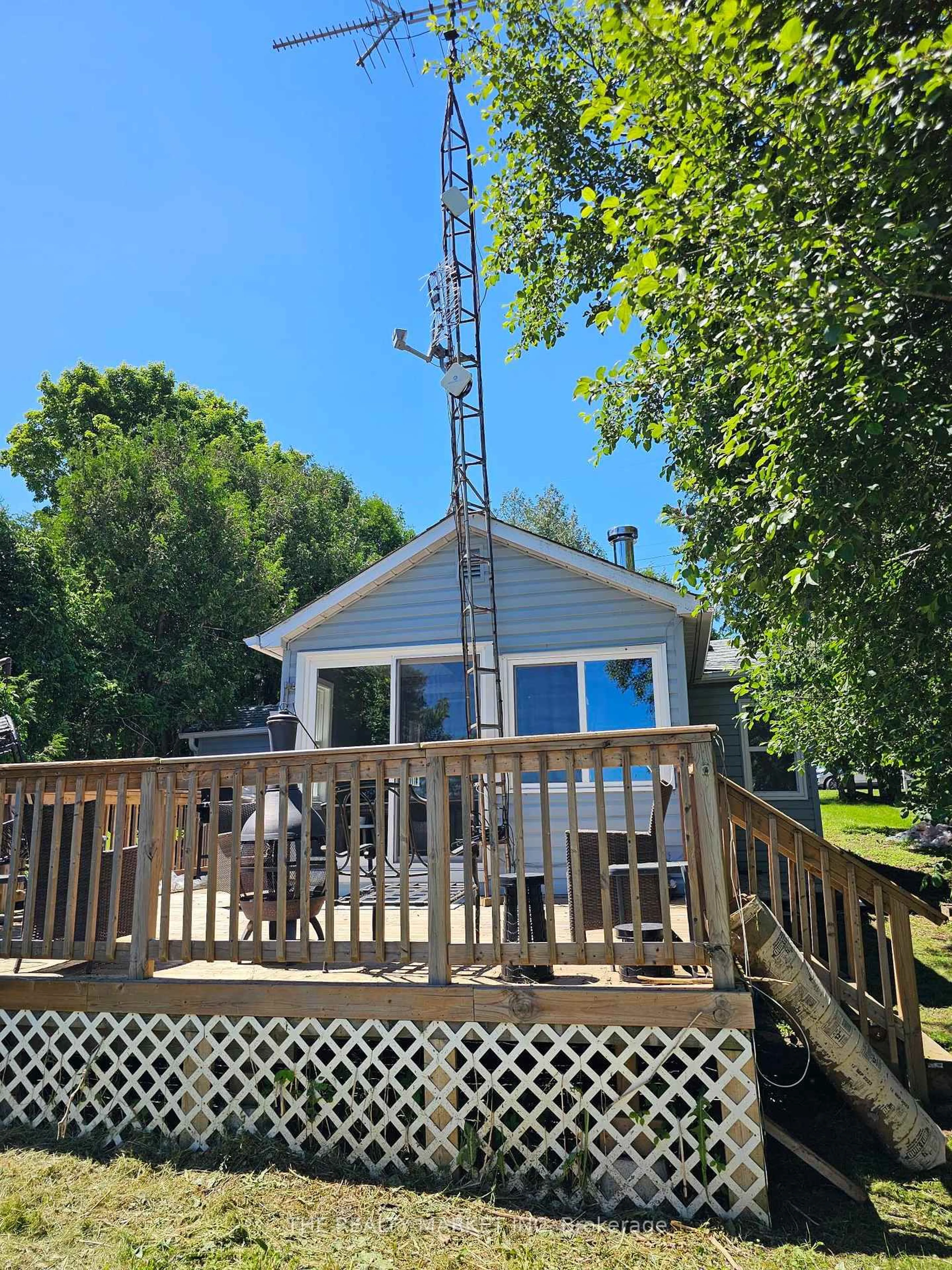 A pic from outside/outdoor area/front of a property/back of a property/a pic from drone, water/lake/river/ocean view for 30 Beach Rd, Kawartha Lakes Ontario K0M 2C0