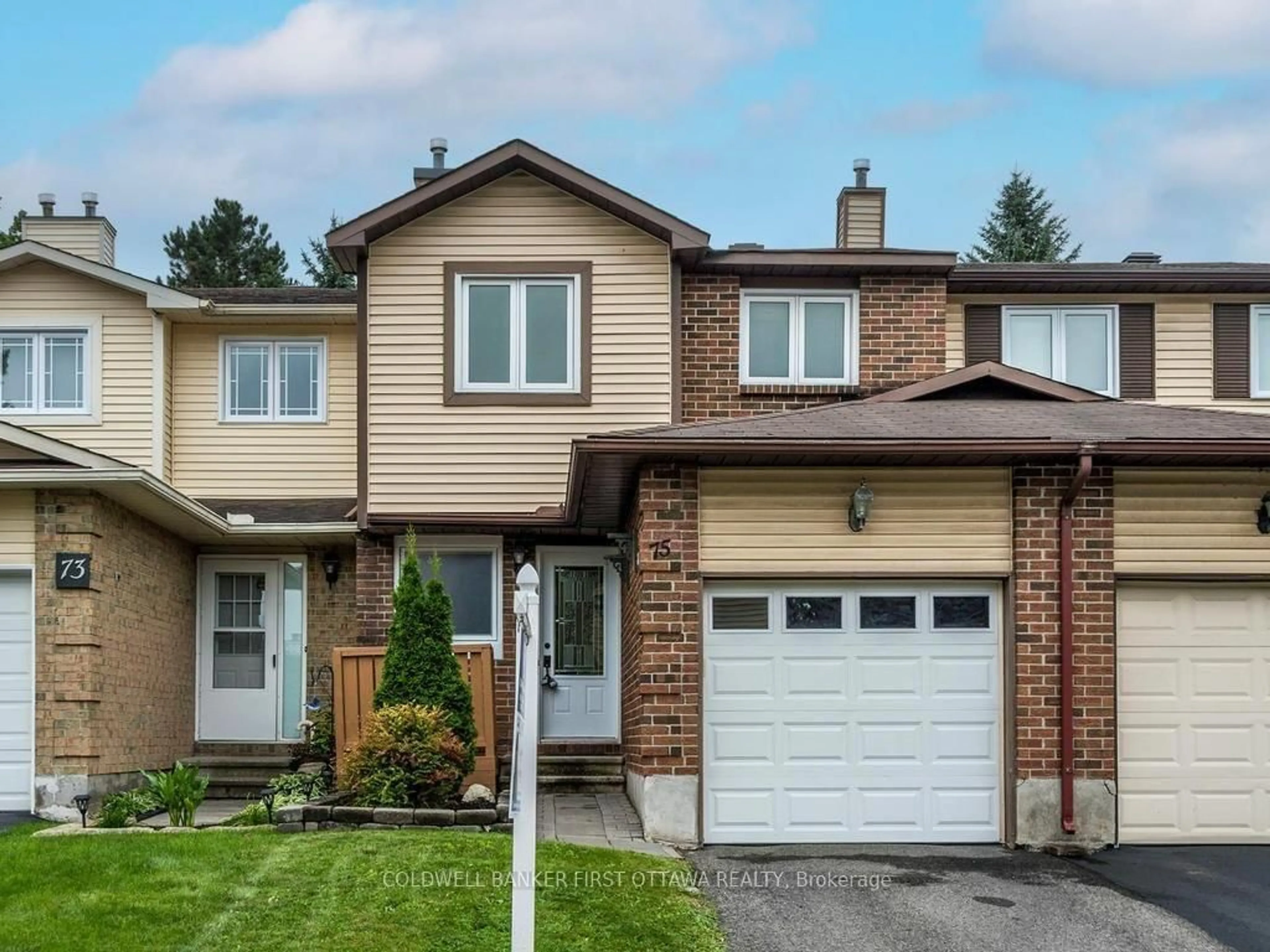Home with brick exterior material, street for 75 Sundback Lane, Kanata Ontario K2L 2W8