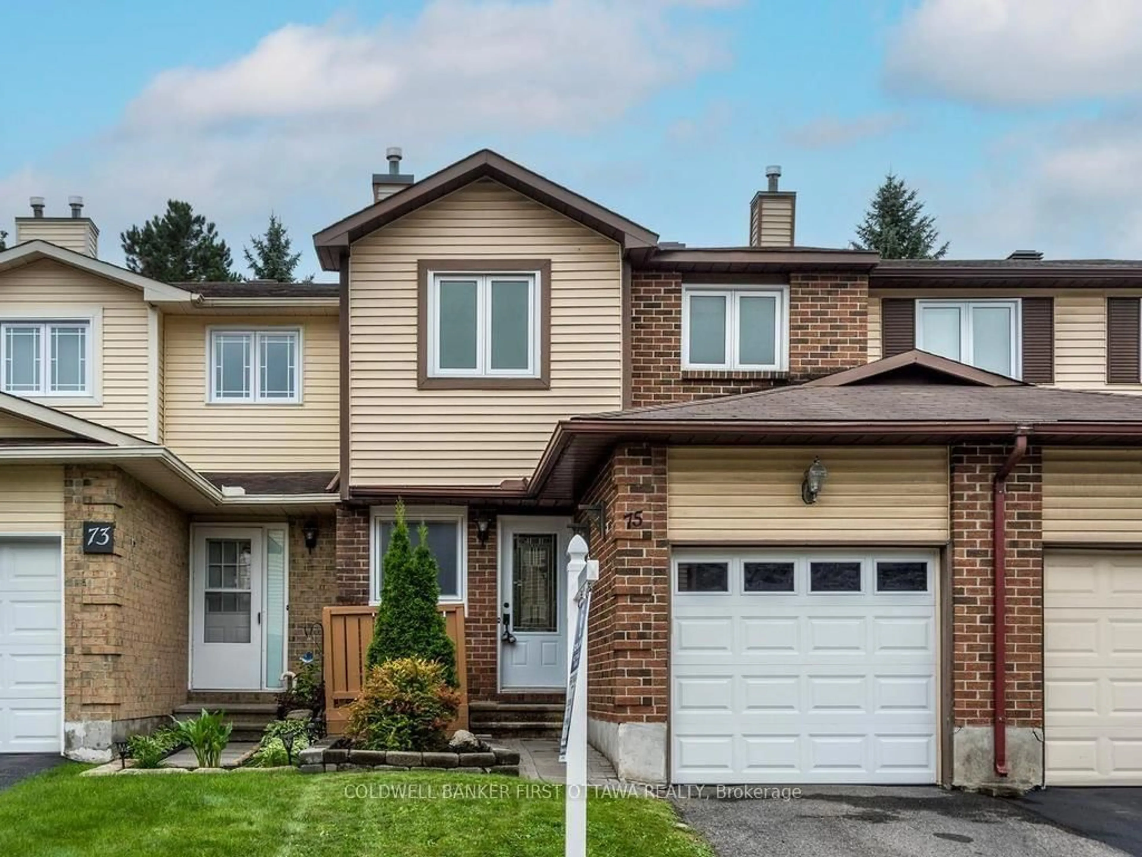 Home with brick exterior material, street for 75 Sundback Lane, Kanata Ontario K2L 2W8
