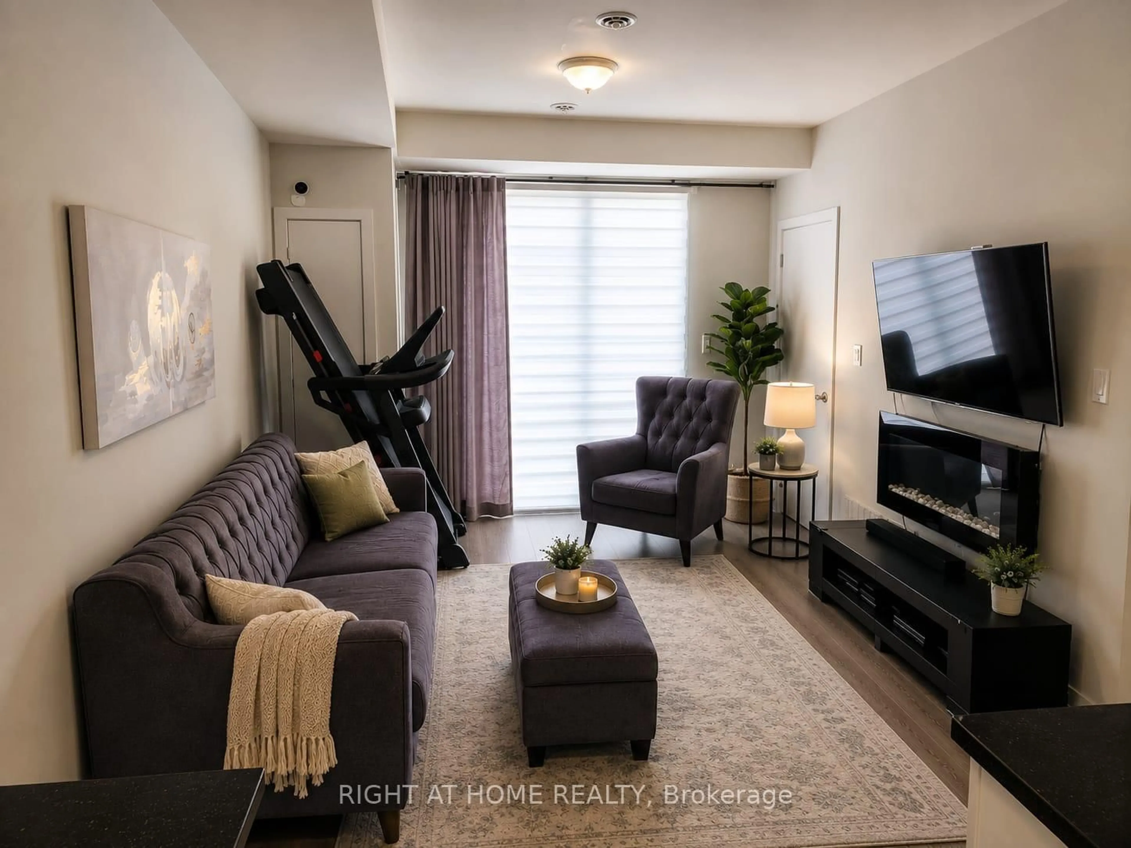 Living room with furniture, unknown for 590 North Service Rd #15, Hamilton Ontario L8E 0K5