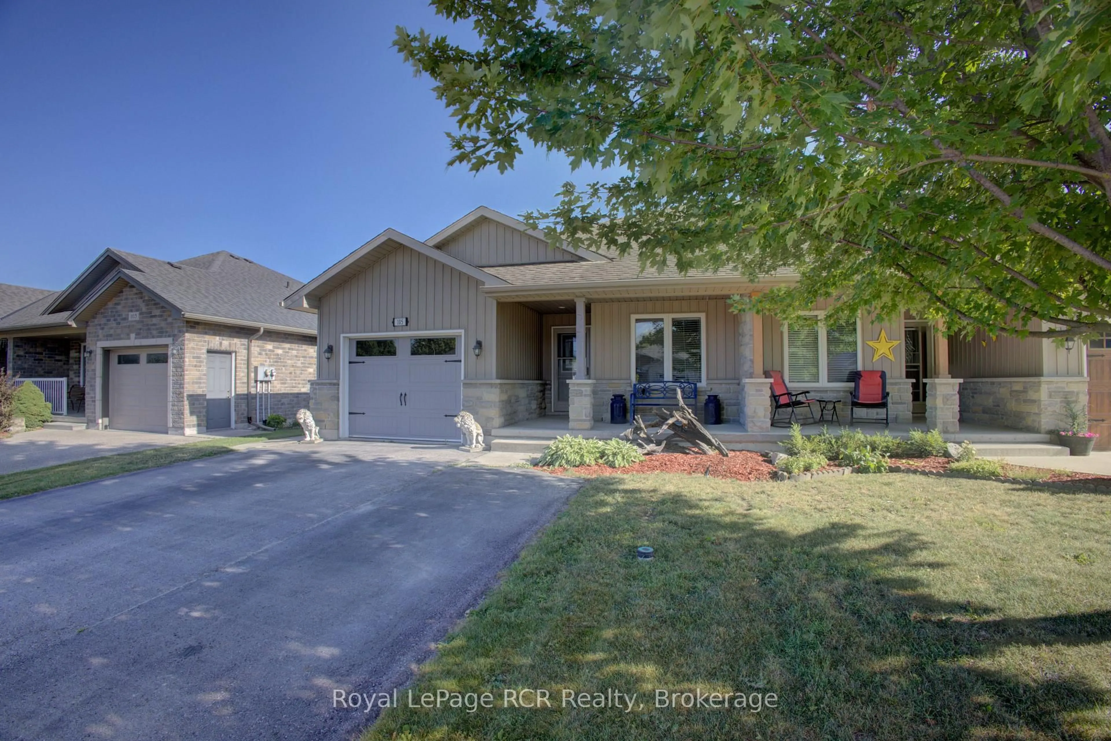 A pic from outside/outdoor area/front of a property/back of a property/a pic from drone, street for 105 Milton Seiler Cres, Minto Ontario N0G 2P0