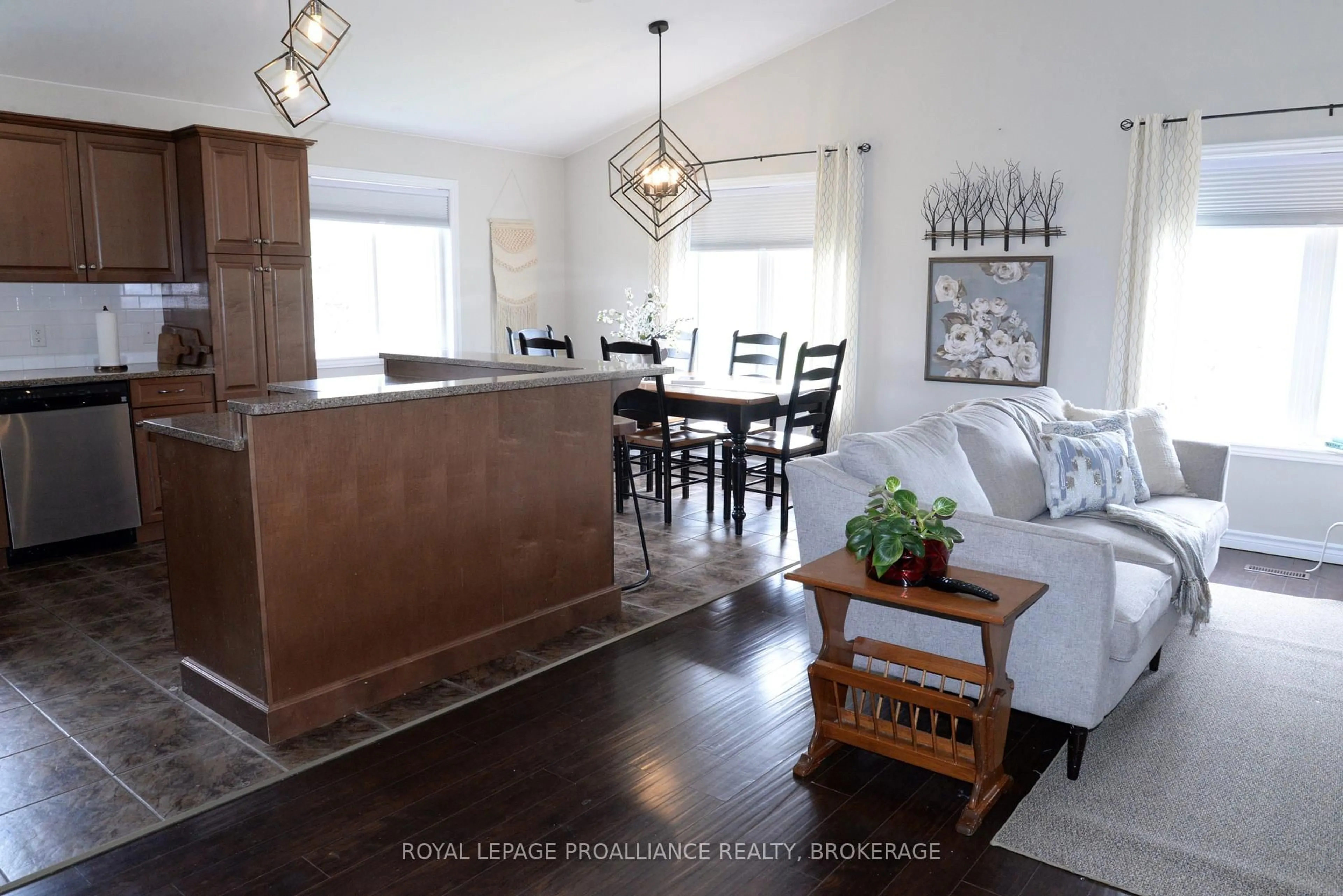 Open concept kitchen, wood/laminate floor for 4153 Mangan Blvd, Seeley's Bay Ontario K0H 2N0