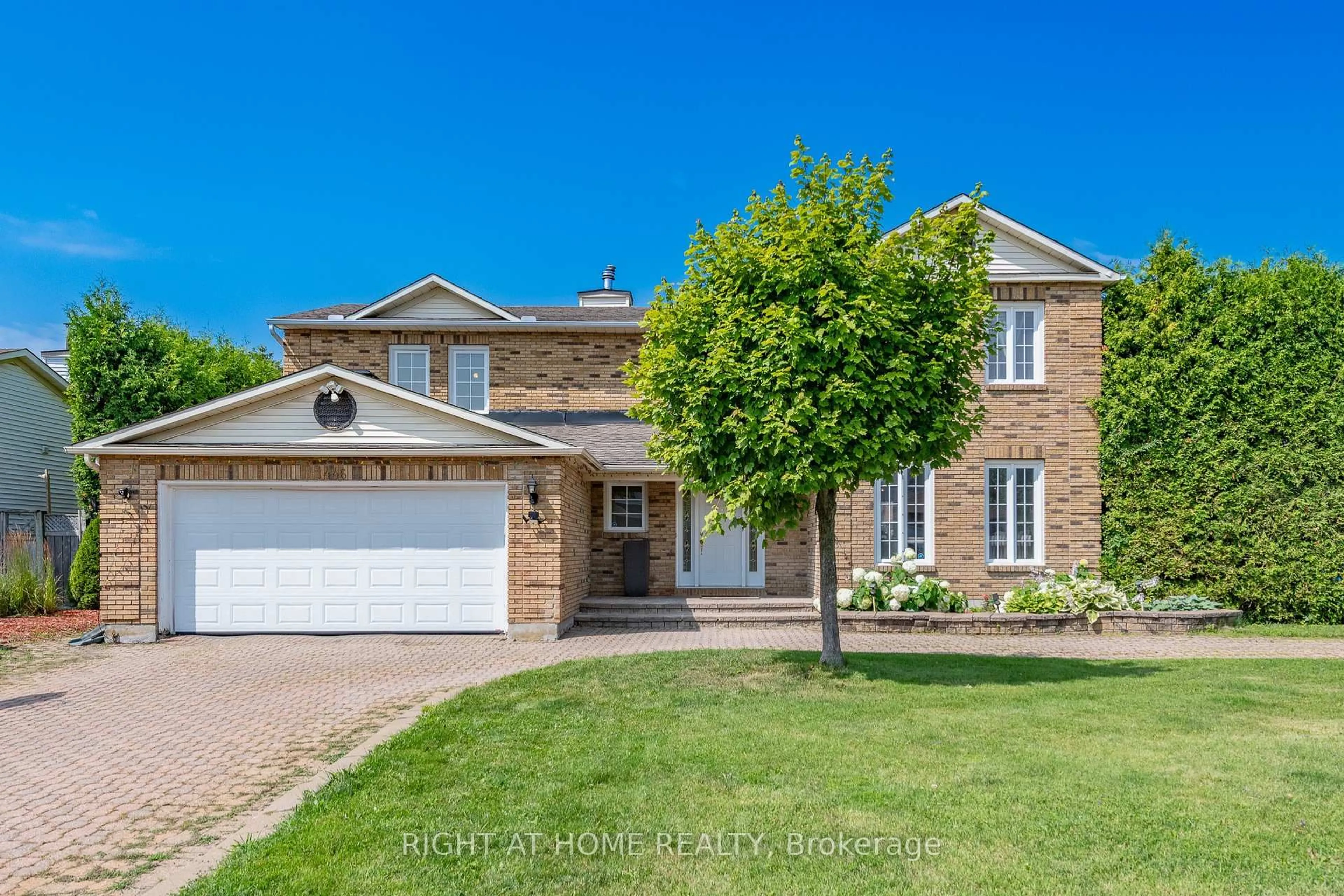 Home with brick exterior material, street for 1446 Bourcier Dr, Orleans Ontario K1E 3J9