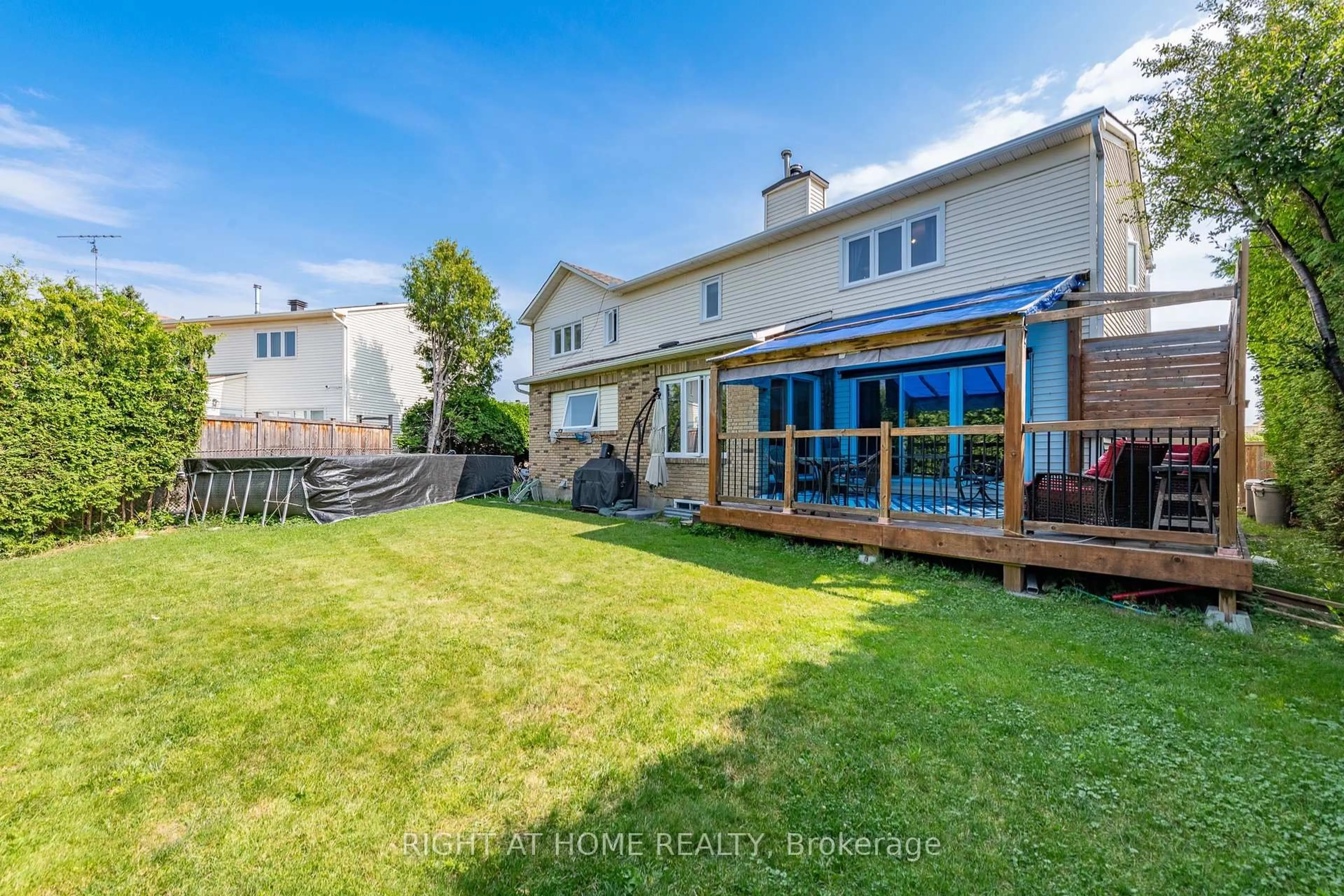 A pic from outside/outdoor area/front of a property/back of a property/a pic from drone, street for 1446 Bourcier Dr, Orleans Ontario K1E 3J9