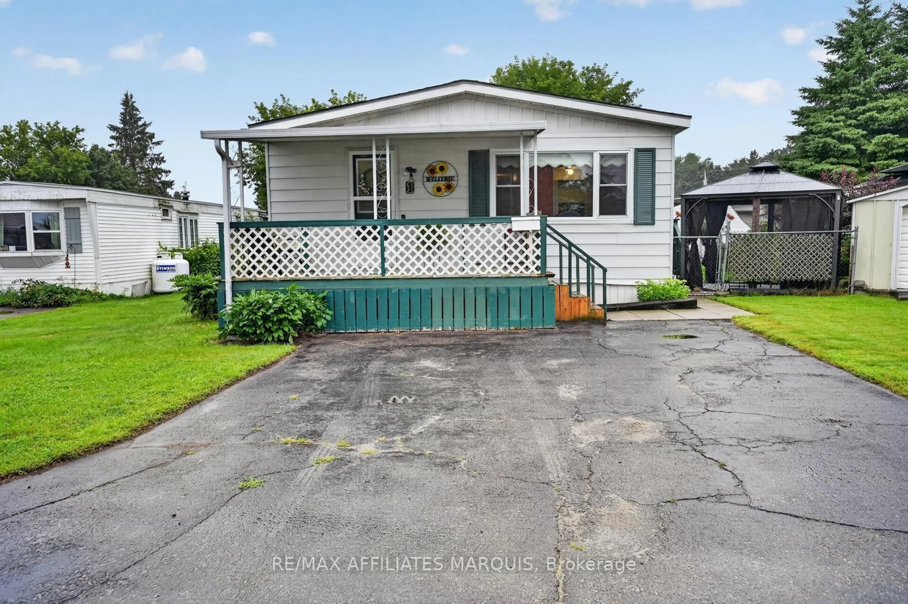 Home with vinyl exterior material, street for 1 Kavanagh Dr, Rideau Lakes Ontario K7A 4S5