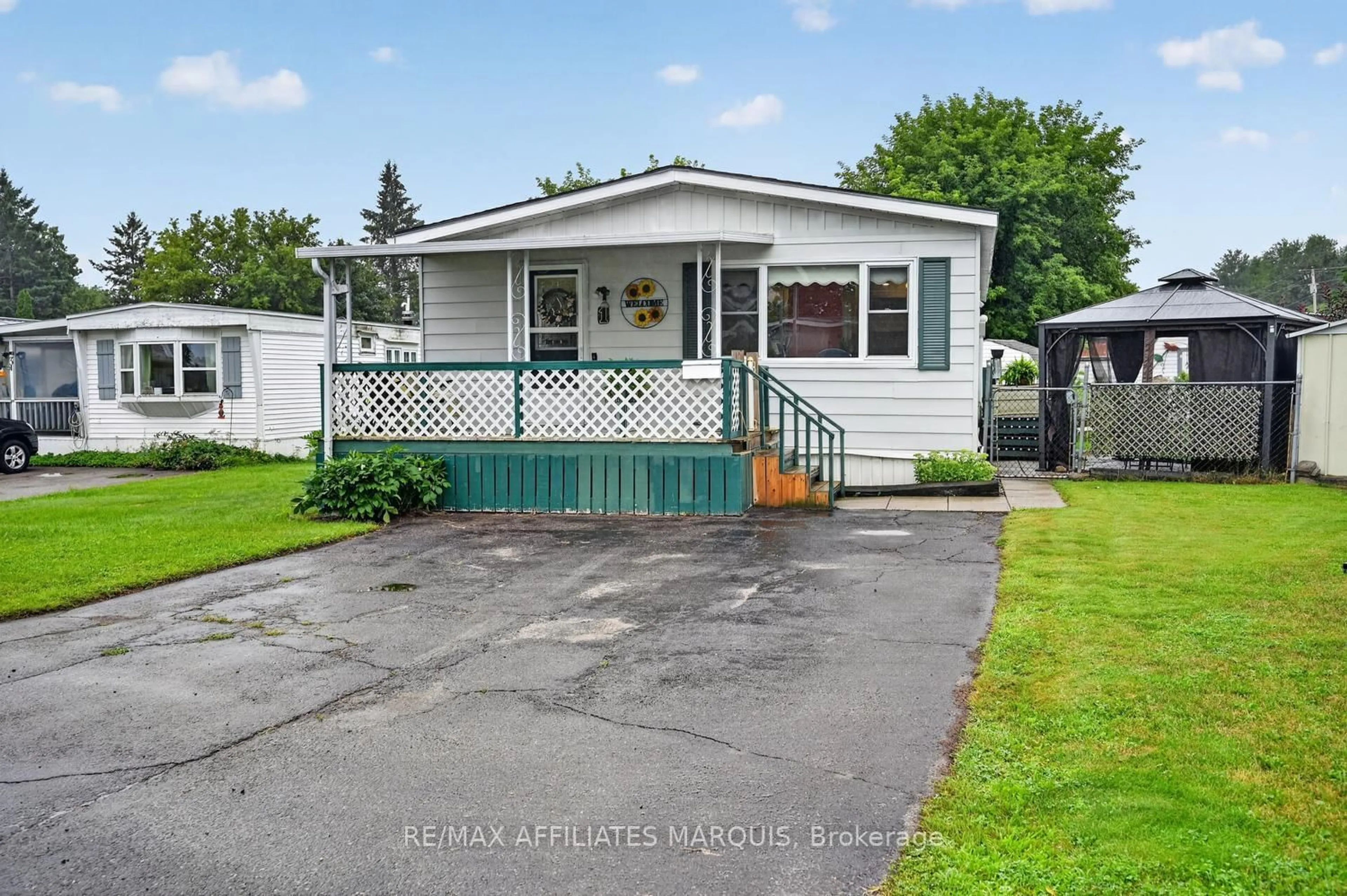 Home with vinyl exterior material, street for 1 Kavanagh Dr, Rideau Lakes Ontario K7A 4S5