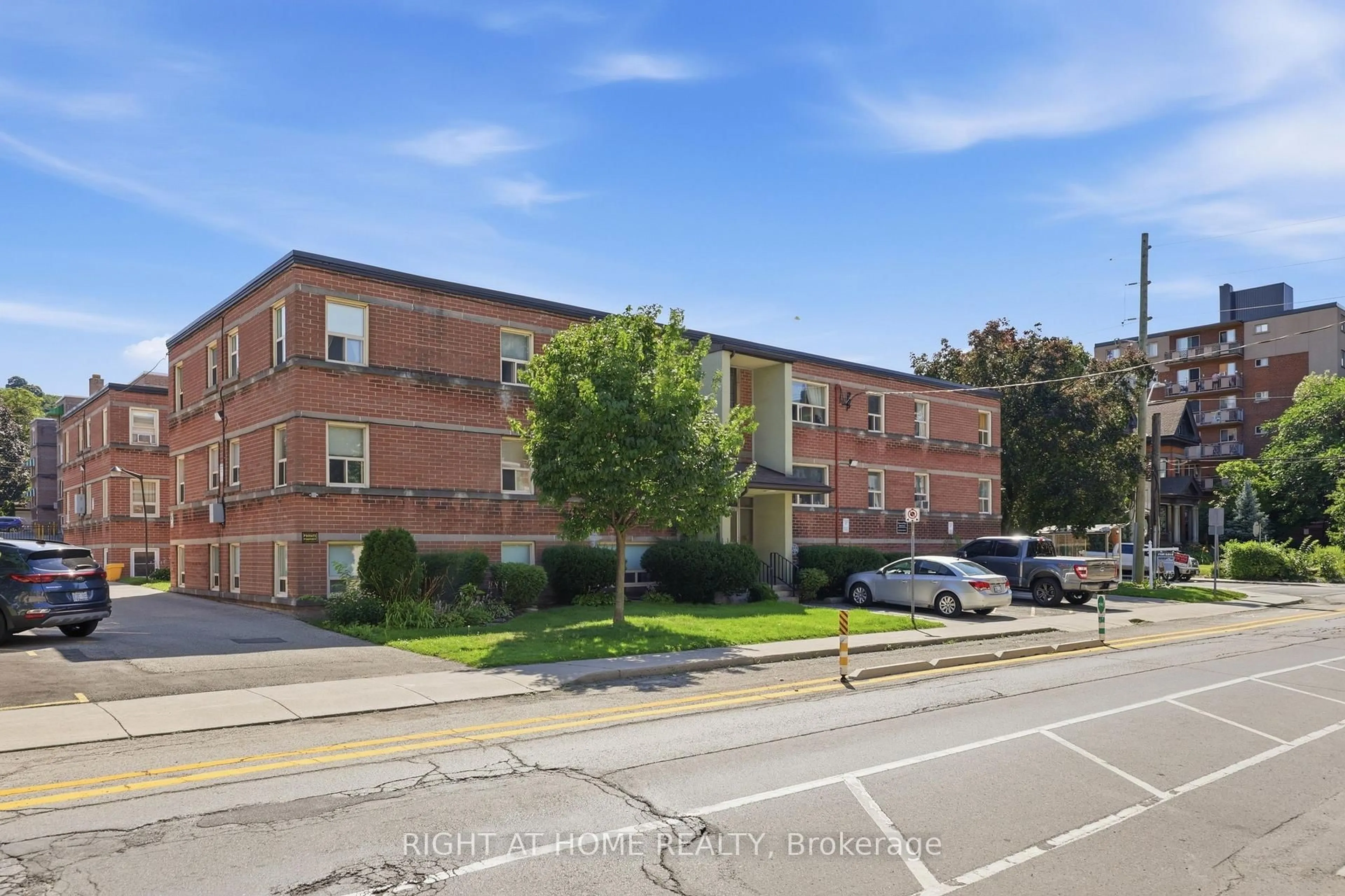 A pic from outside/outdoor area/front of a property/back of a property/a pic from drone, street for 223 MacNab St #11, Hamilton Ontario L8P 3C9