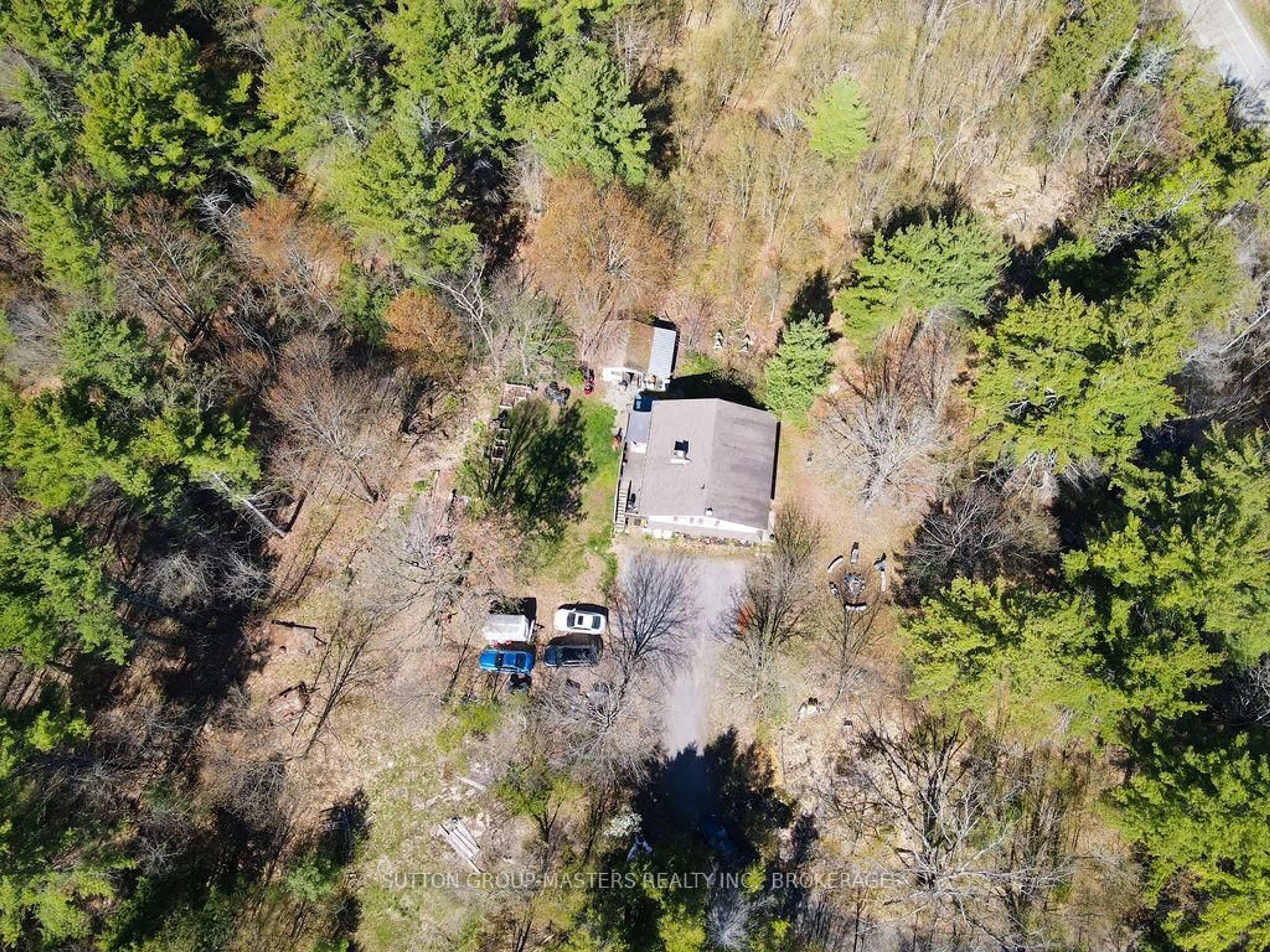 A pic from outside/outdoor area/front of a property/back of a property/a pic from drone, forest/trees view for 1839 Oak Flats Rd, Godfrey Ontario K0H 1T0