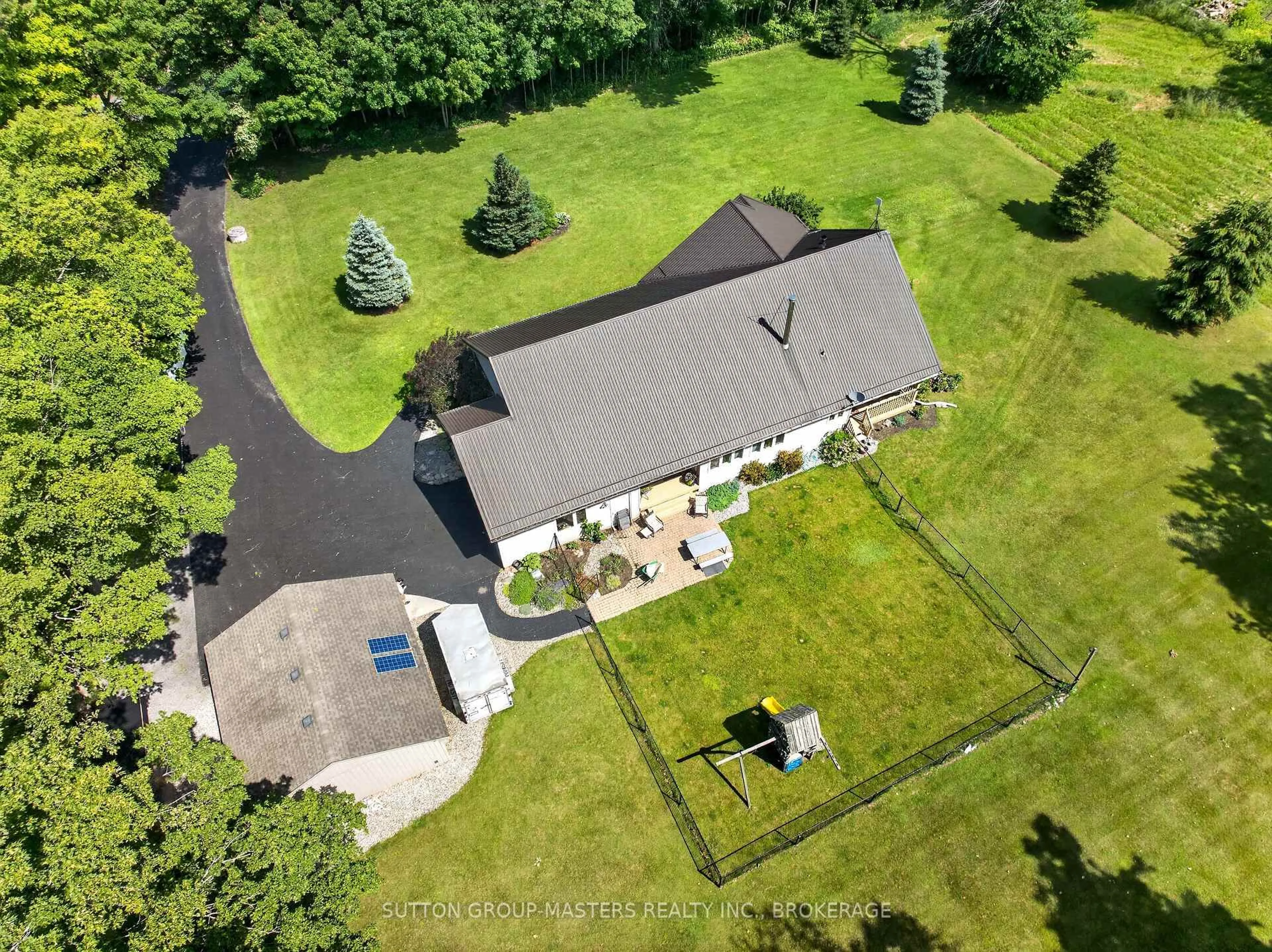 A pic from outside/outdoor area/front of a property/back of a property/a pic from drone, street for 710 Maple Rd, Bissett Creek Ontario K0H 2H0
