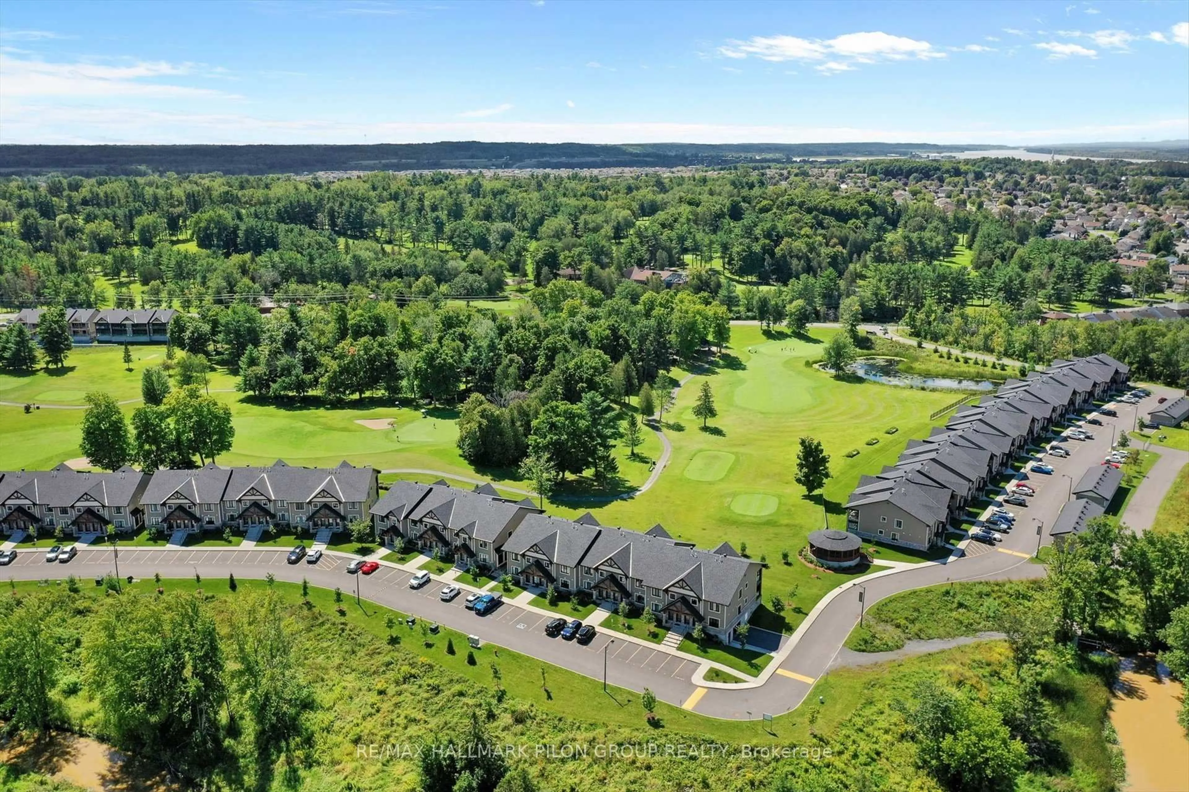 A pic from outside/outdoor area/front of a property/back of a property/a pic from drone, unknown for 308 Masters Lane #295, Clarence-Rockland Ontario K4K 0L3