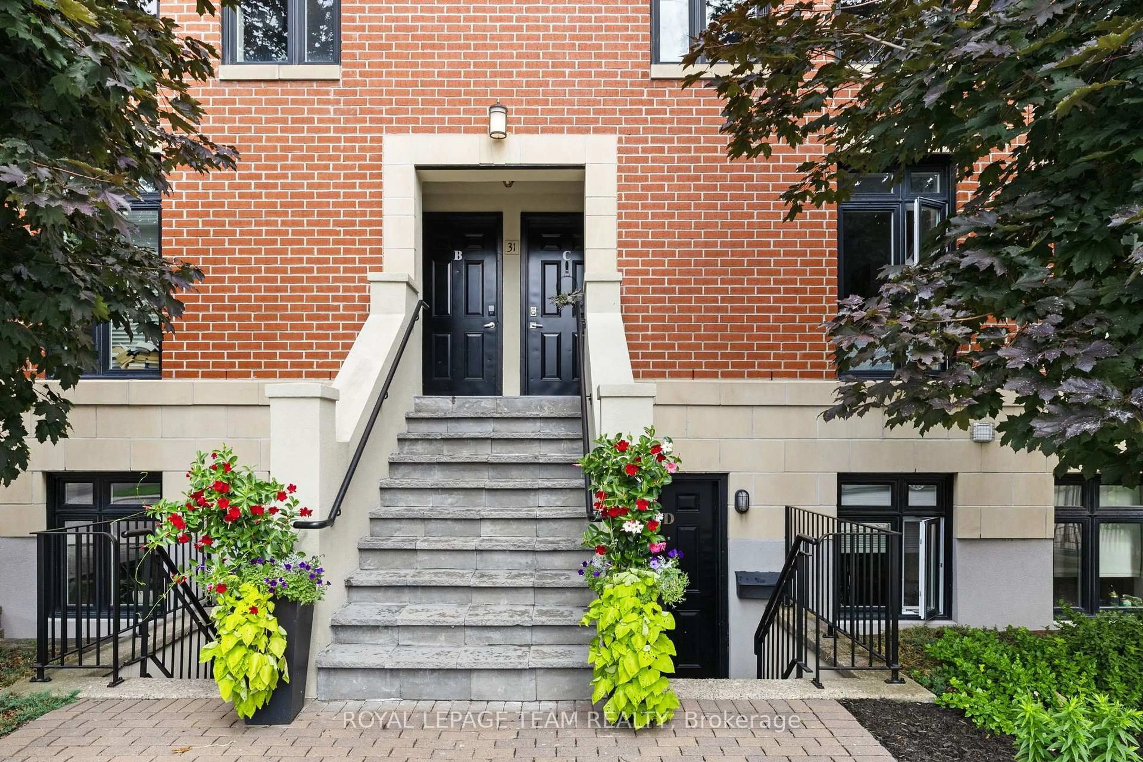Home with brick exterior material, street for 31 Springfield Rd #C, Ottawa Ontario K1M 1C8