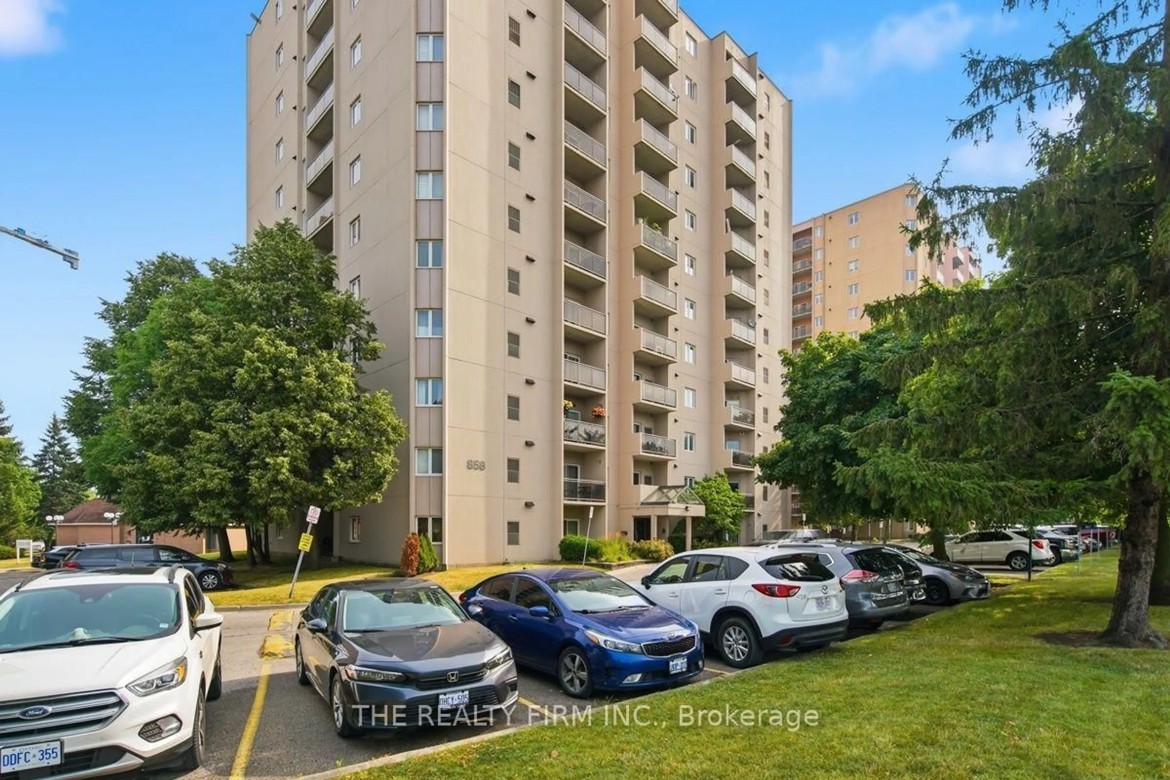 A pic from outside/outdoor area/front of a property/back of a property/a pic from drone, unknown for 858 Commissioners Rd #1206, London South Ontario N6C 5Y5