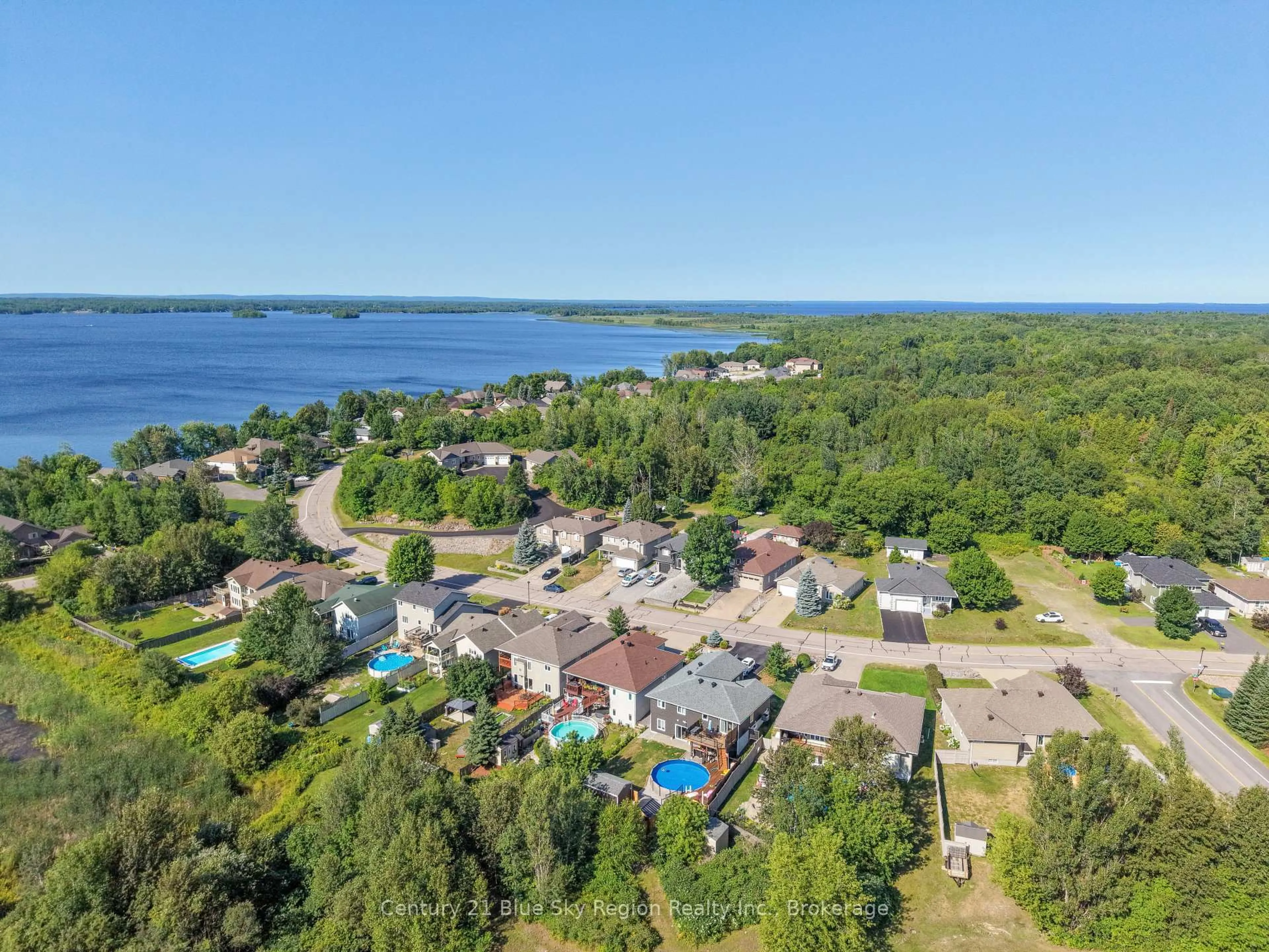 A pic from outside/outdoor area/front of a property/back of a property/a pic from drone, water/lake/river/ocean view for 82 Kilby Lane, Callander Ontario P0H 1H0