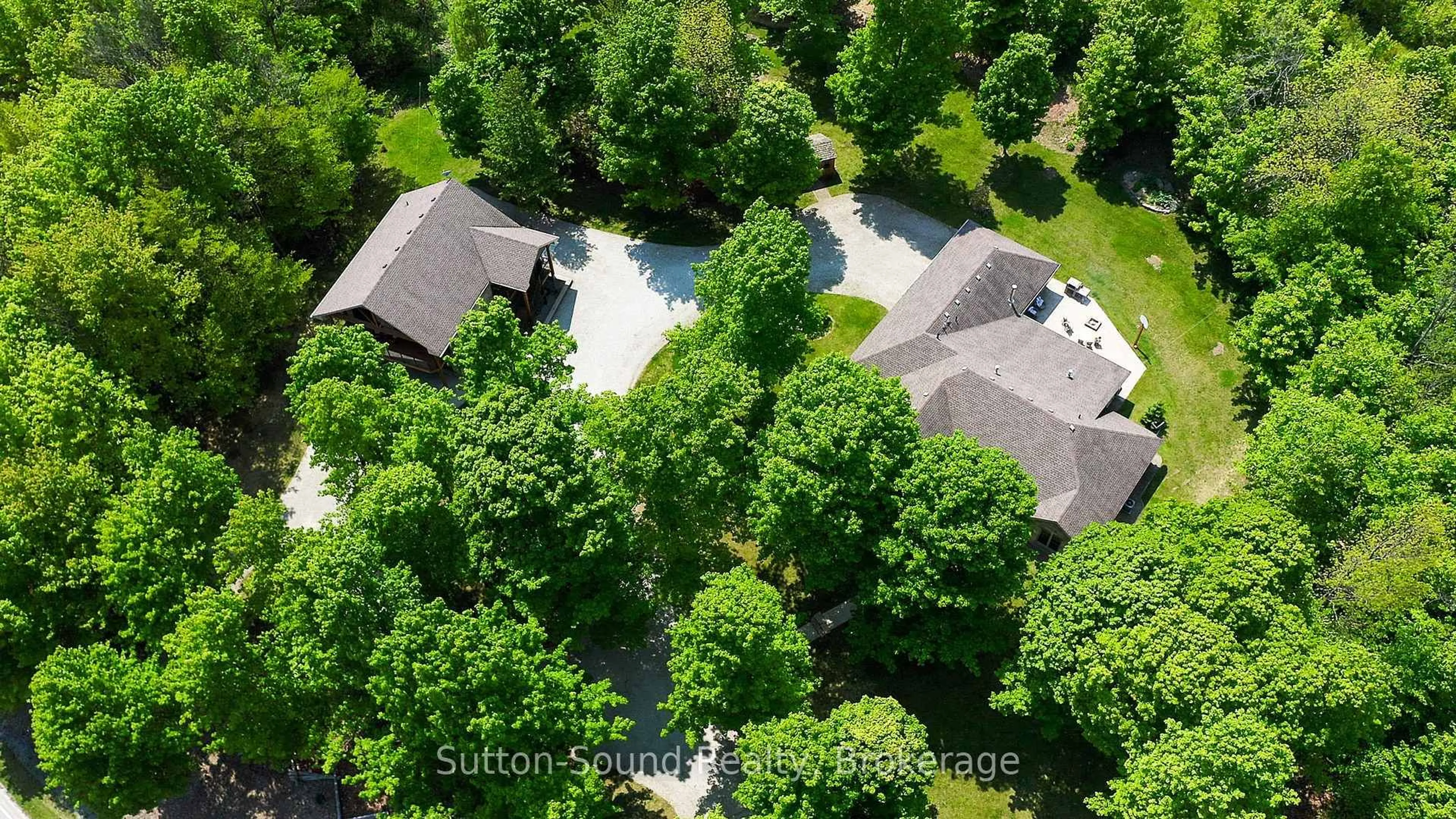 A pic from outside/outdoor area/front of a property/back of a property/a pic from drone, unknown for 505556 Grey Road 1 Rd, Georgian Bluffs Ontario N0H 1S0
